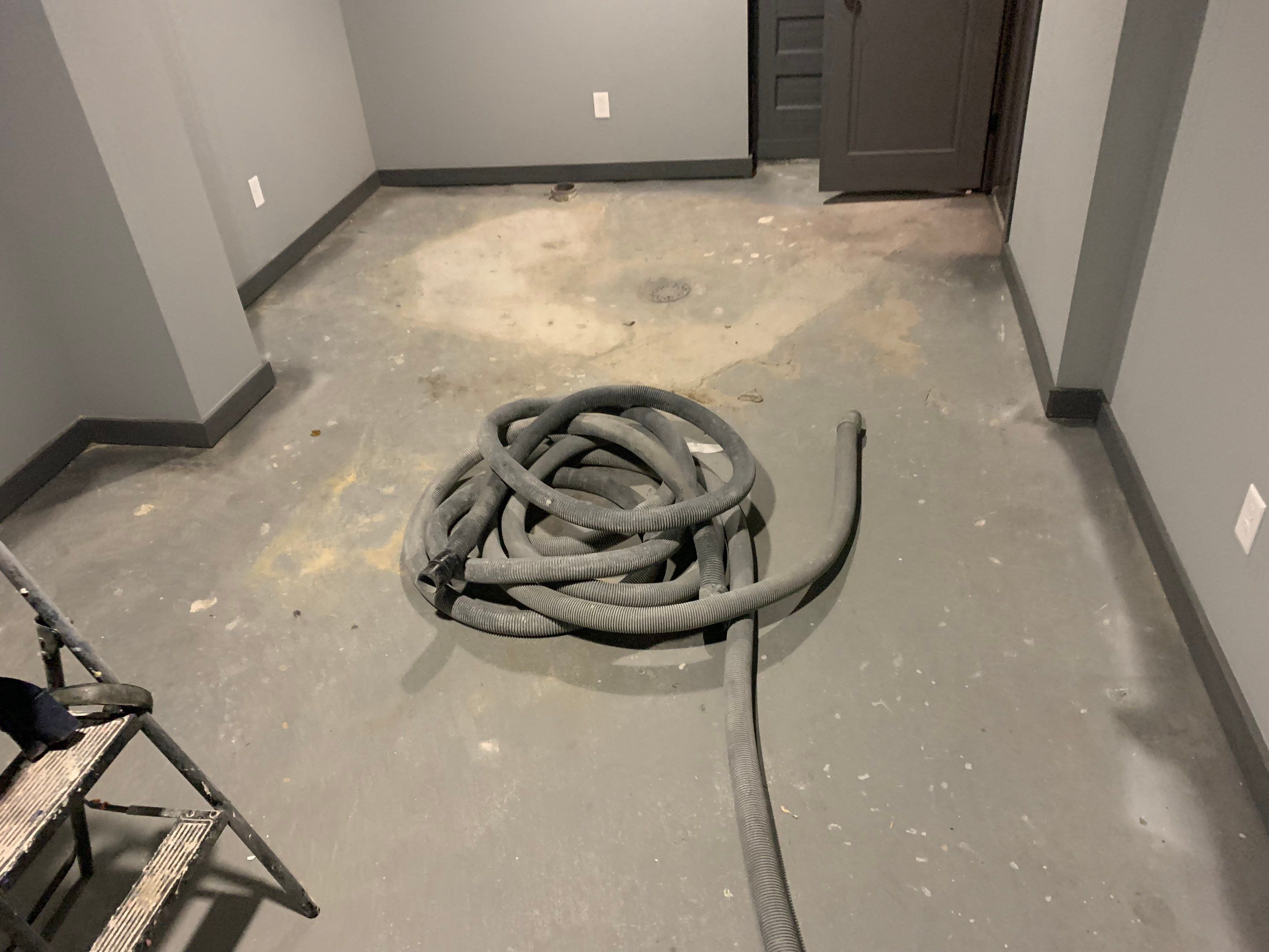 Basement using Slate Stone by Select Painting, Coatings & Garage Cabinets