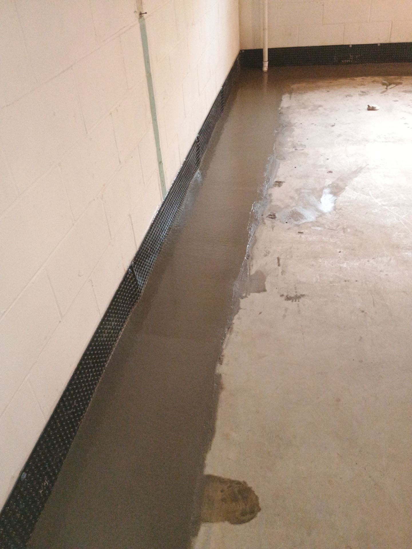 Tying Into an Existing Drain Tile System for Alec by Waterproofing Northeast