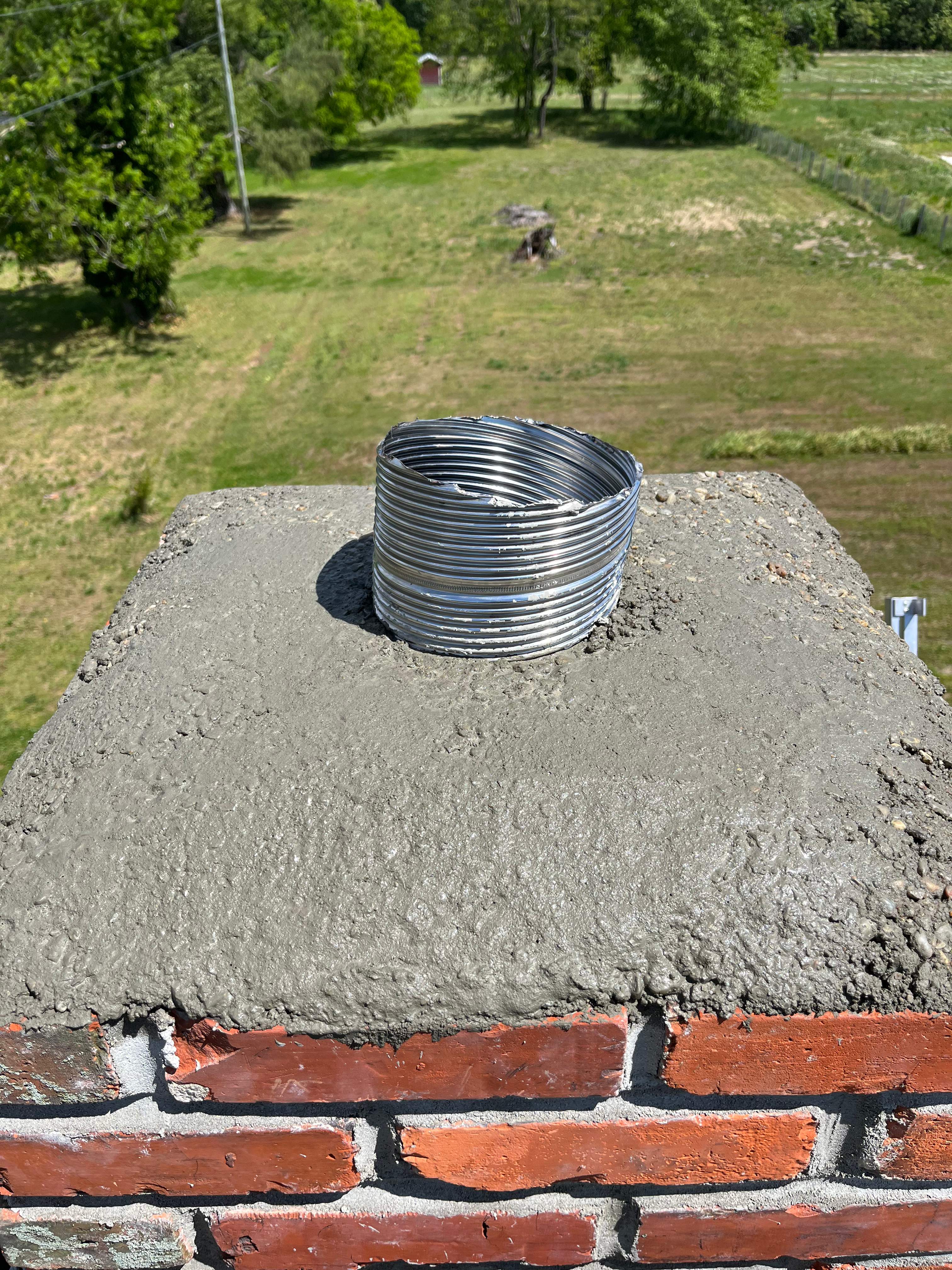 Wood Stove Installation and Fireplace Build by Premier Chimney and Roofing