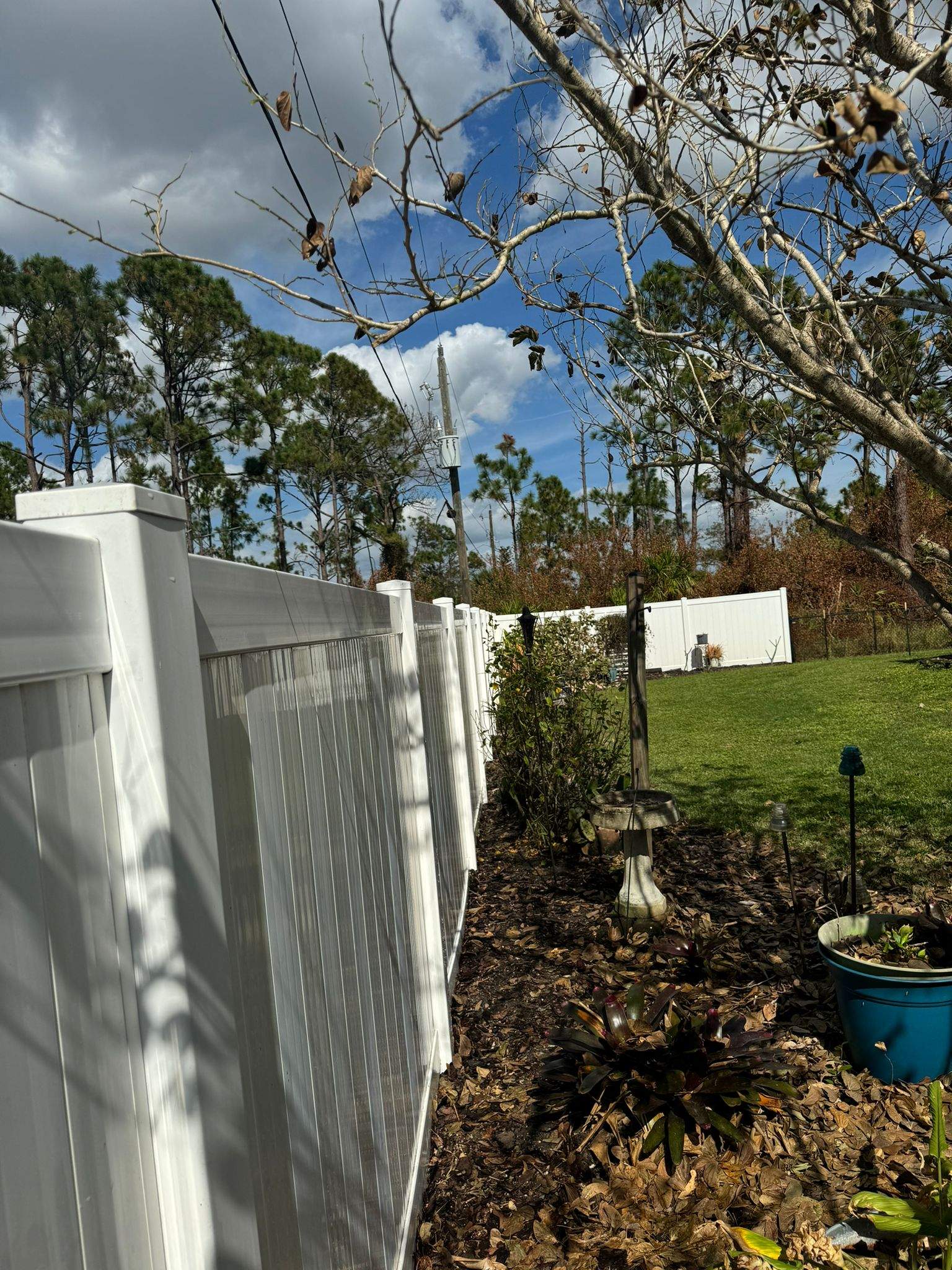 White Vinyl Privacy Fence Installation in Port Charlotte by True Fence LLC