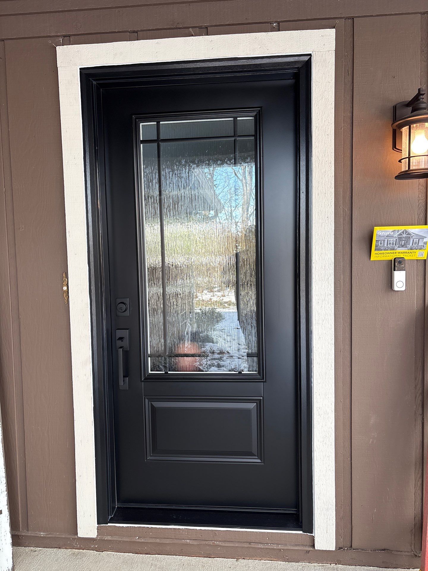 Modern Black Front Door Installation in Greenwood by Merrifield Exteriors, LLC