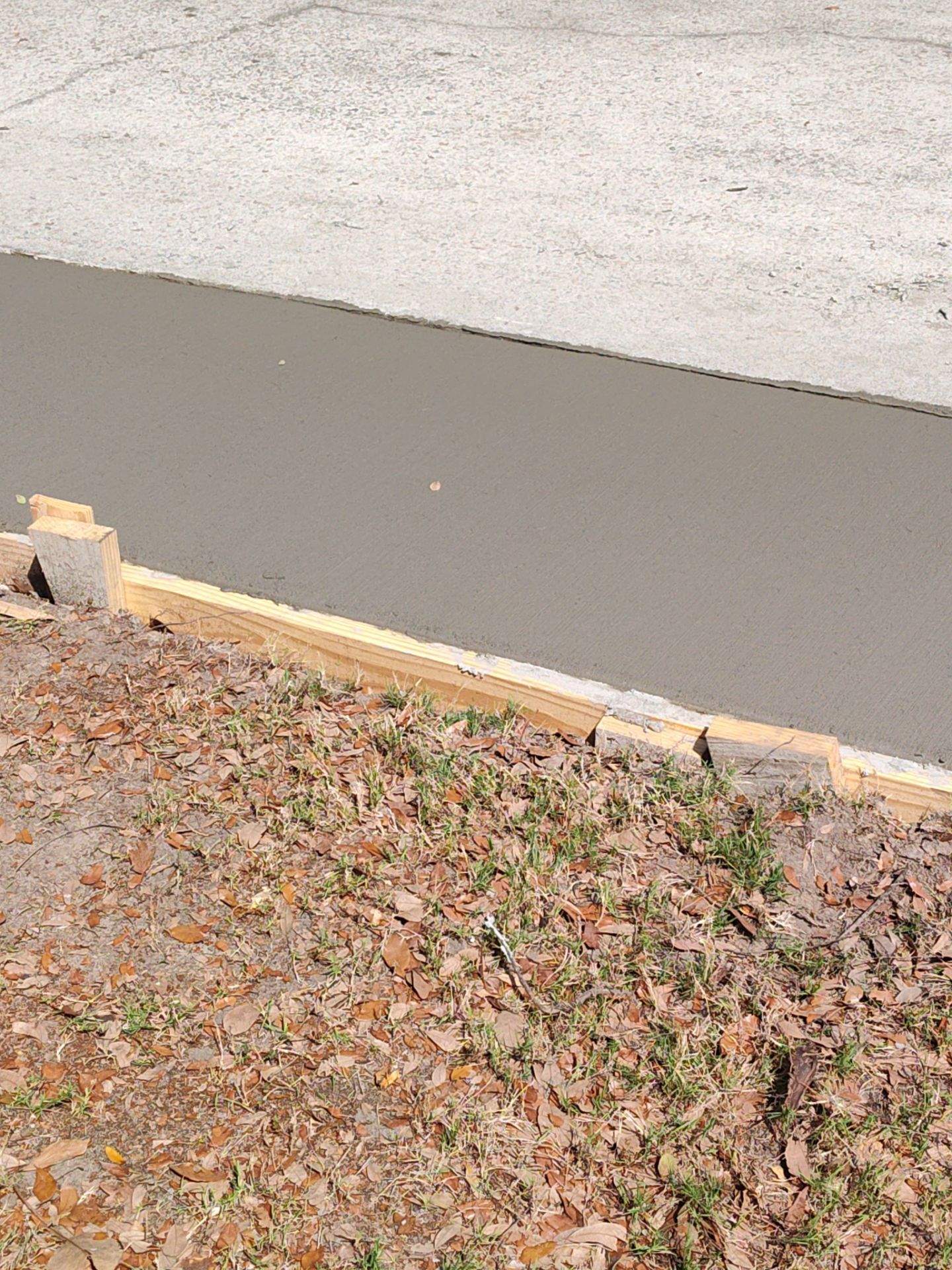 Outside porch and concreate work by Cornerstone Home Builders, LLC