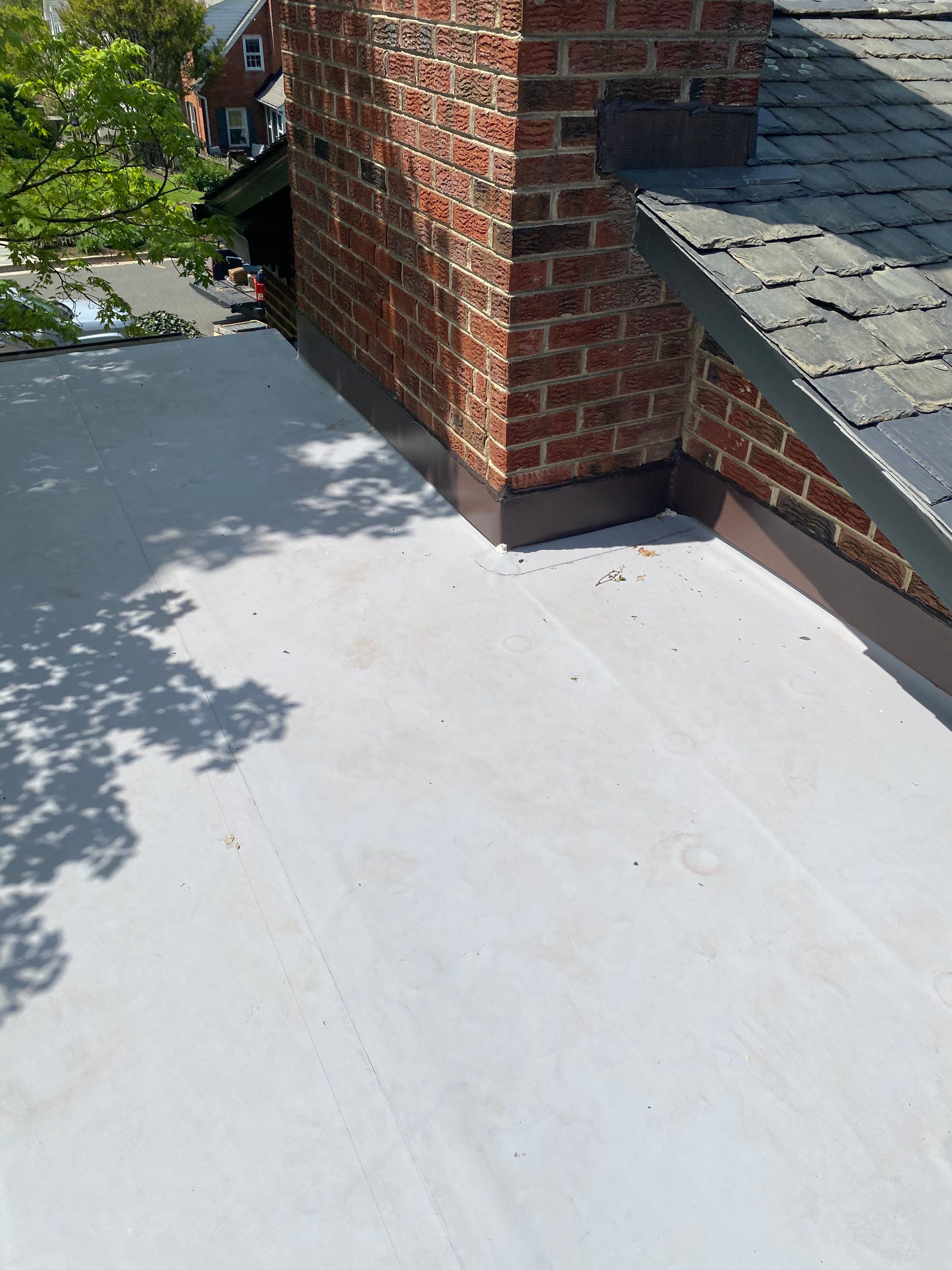 Arlington: Buckingham Slate and Carlisle Syntec TPO Roof by RM Banning, Inc.