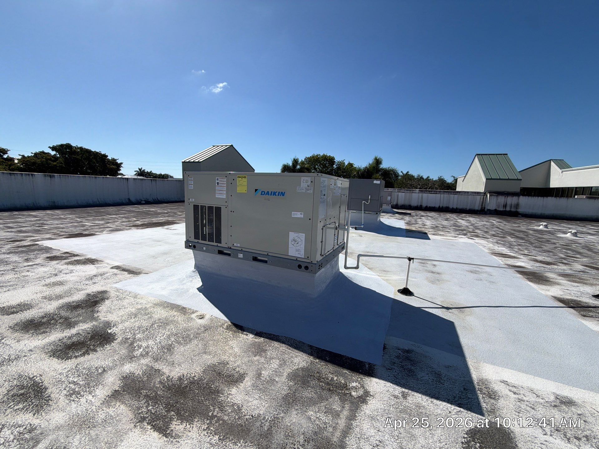 Commercial Flat Roof Restoration and Elastomeric Waterproofing in Delray Beach by Roof King LLC