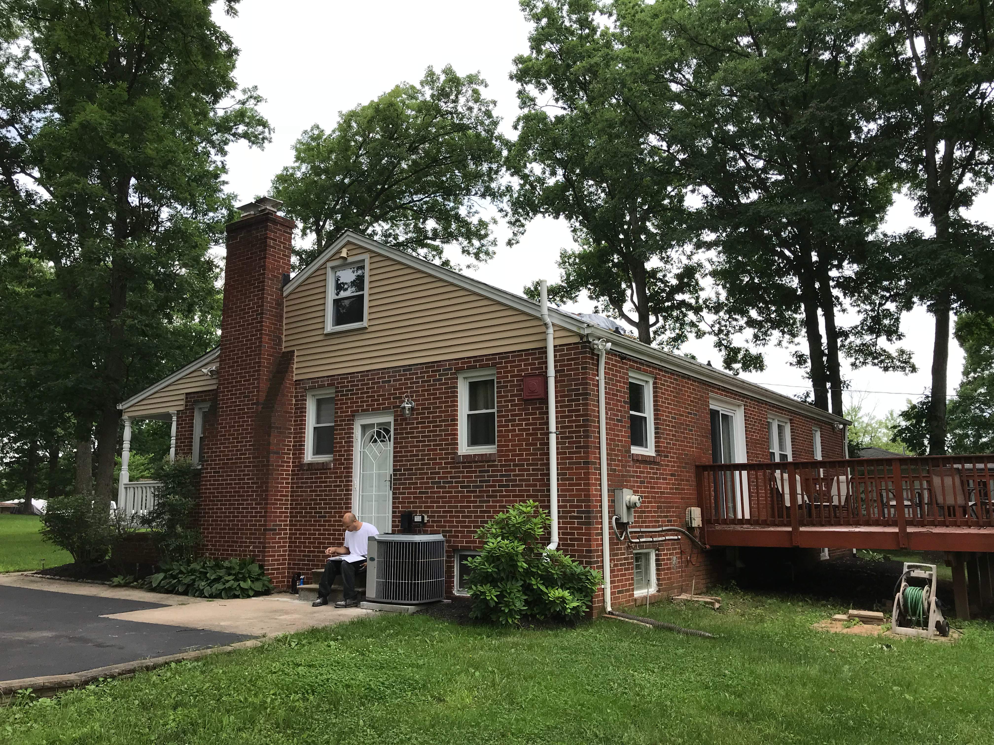 Residential Roofing Installation using Charcoal Black by Alpha Design Services