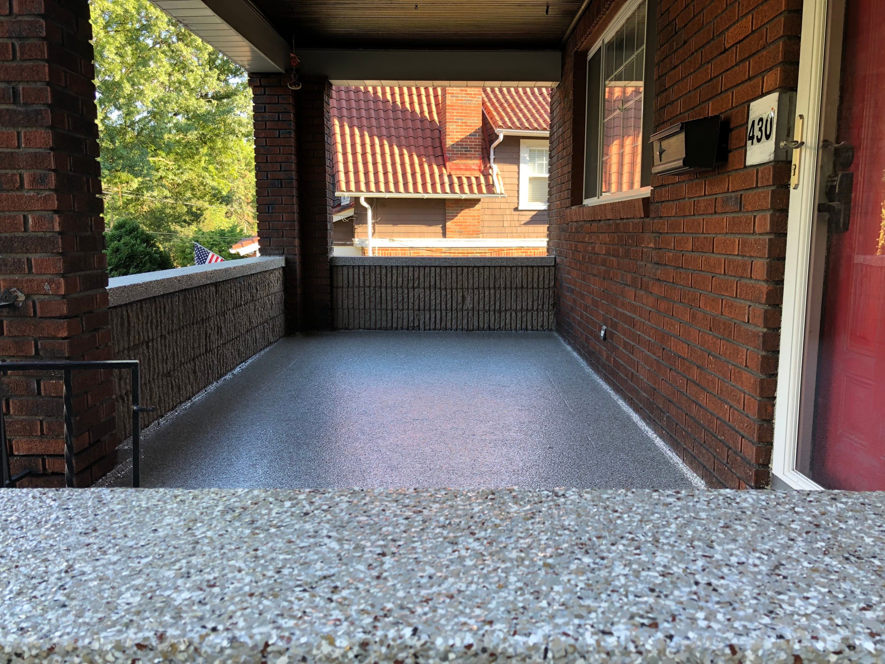 Creekbed Porch by Floors in a Day, Inc