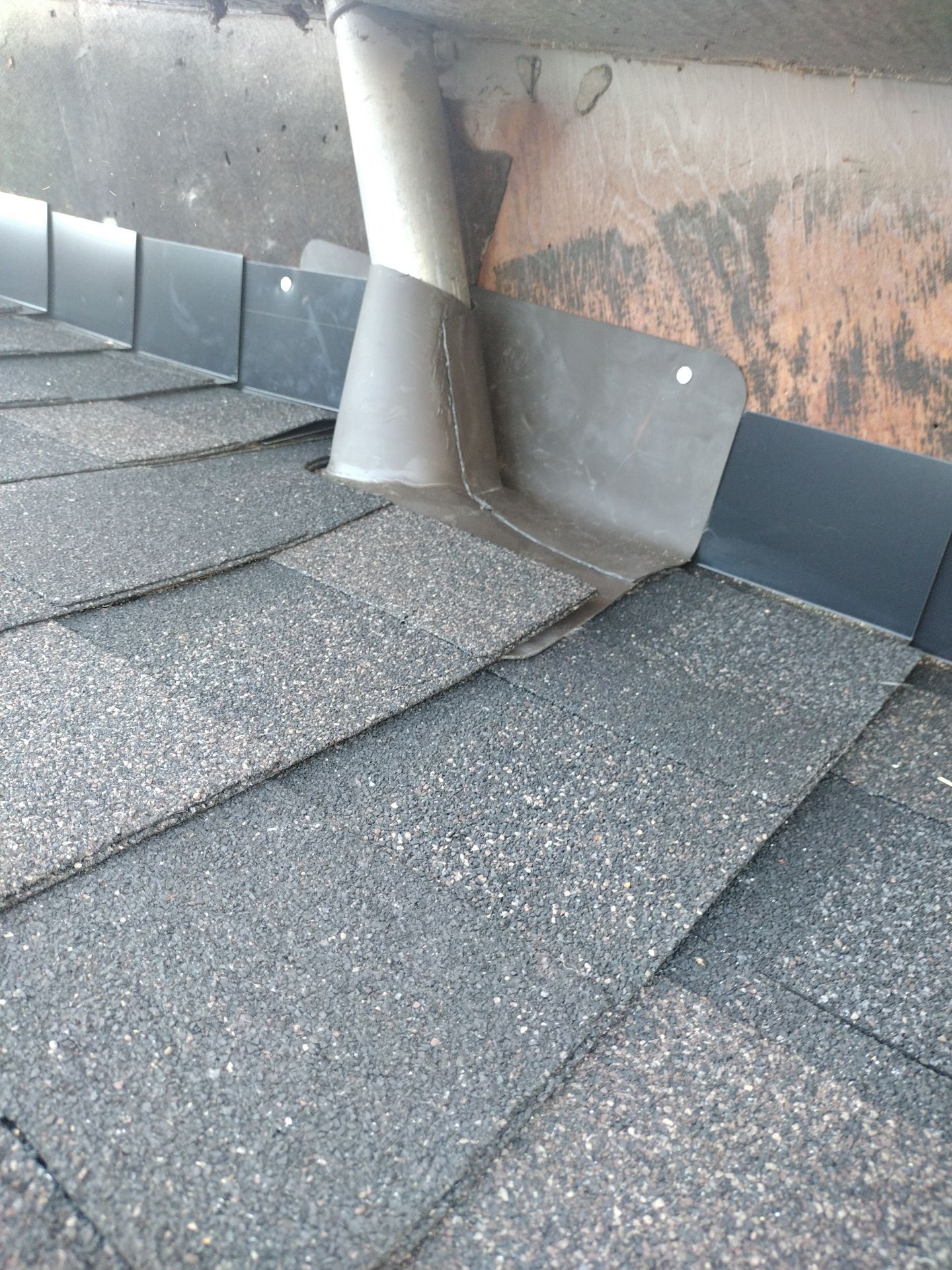 Residential Roof Replacement with Metal Accents by Orezona Building & Roofing Company, Inc.