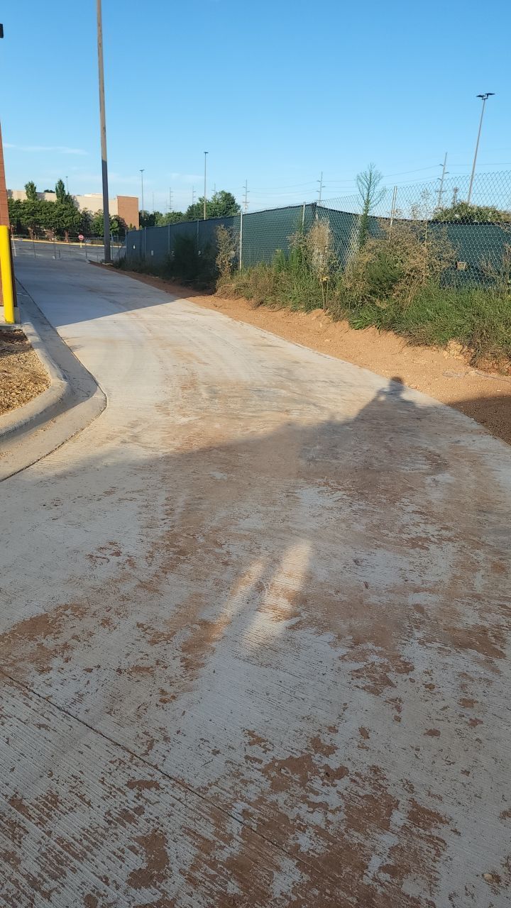 Driveway Clean using cleaner by Power Wash Masters LLC
