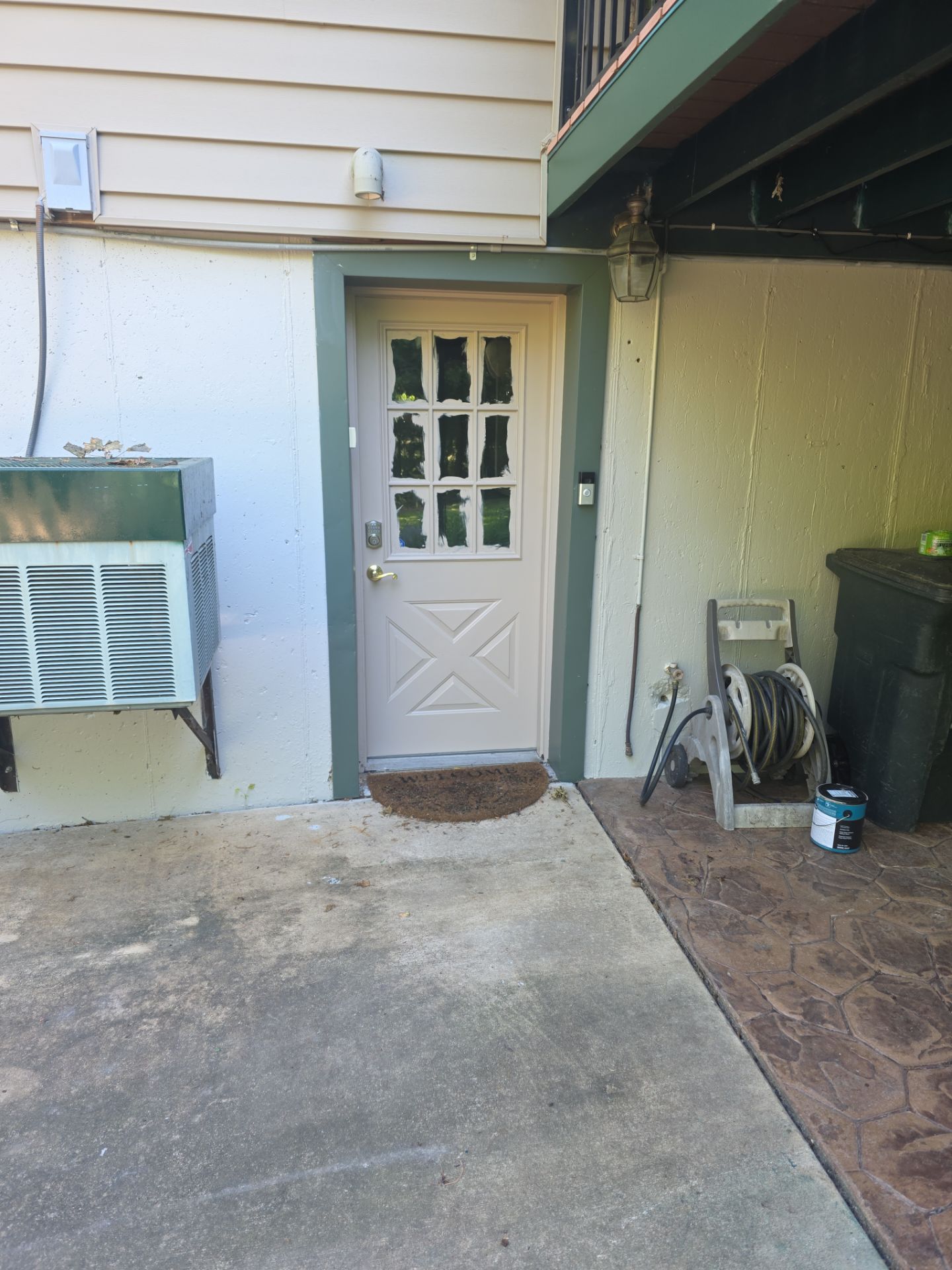 Exterior Entry Door and Garage Door Painting by Legendary Services Company LLC.