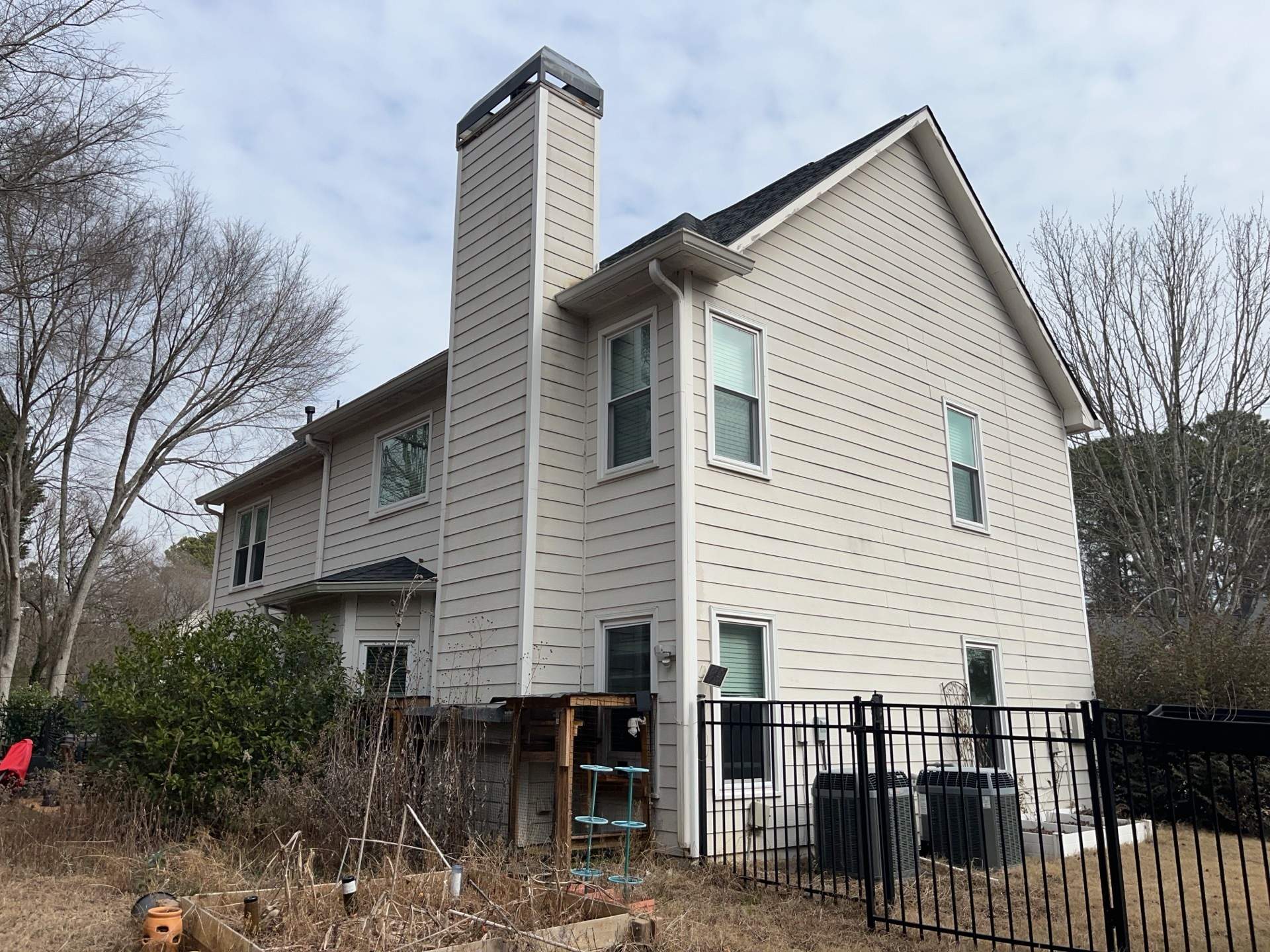 Marietta, GA Chimney Siding, Fascia, and Soffit Replacement using James Hardie Lap Siding, Hardie Trim, and Hardie Panel by Nelson Exteriors 