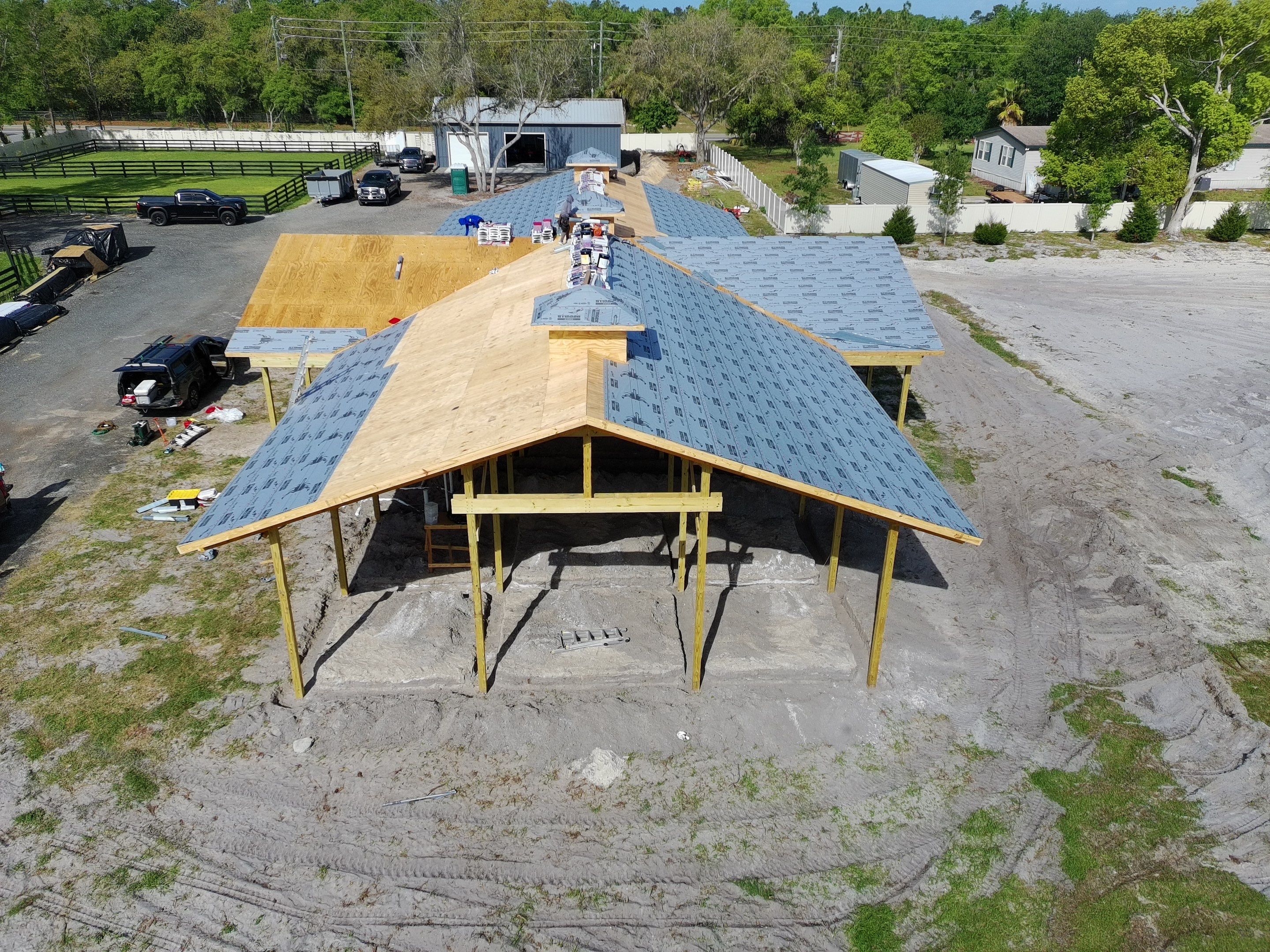 Custom Post-Frame Horse Barn and Shingle Roof Installation in Geneva by Fortified Roofing Solutions Corp.