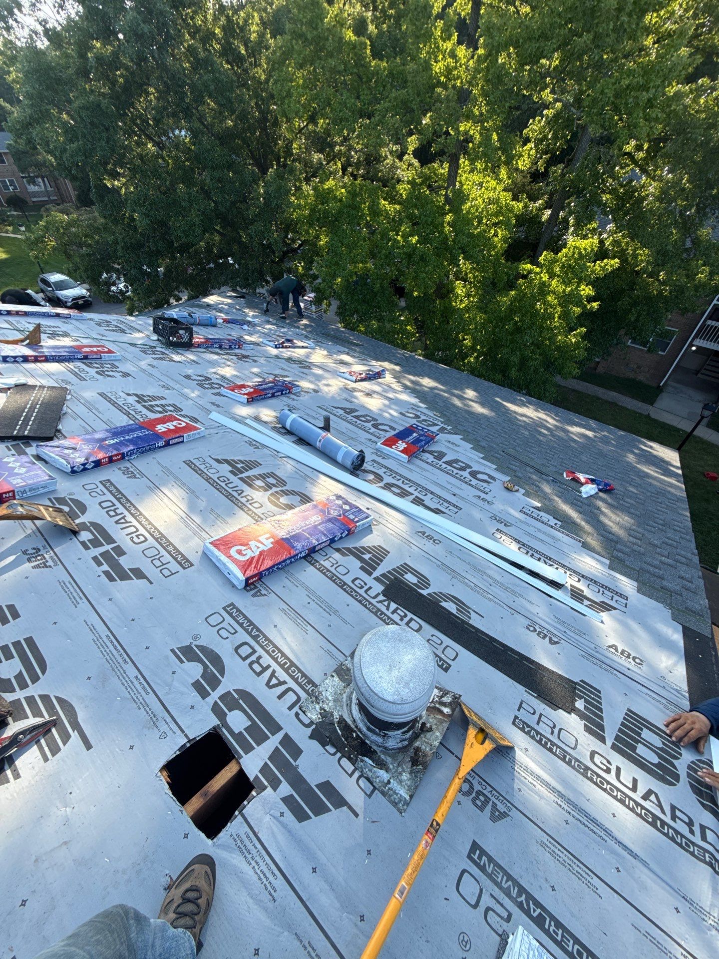 Apartment Complex Roof Replacement and Decking Repair in North Brunswick by JVW ROOFING
