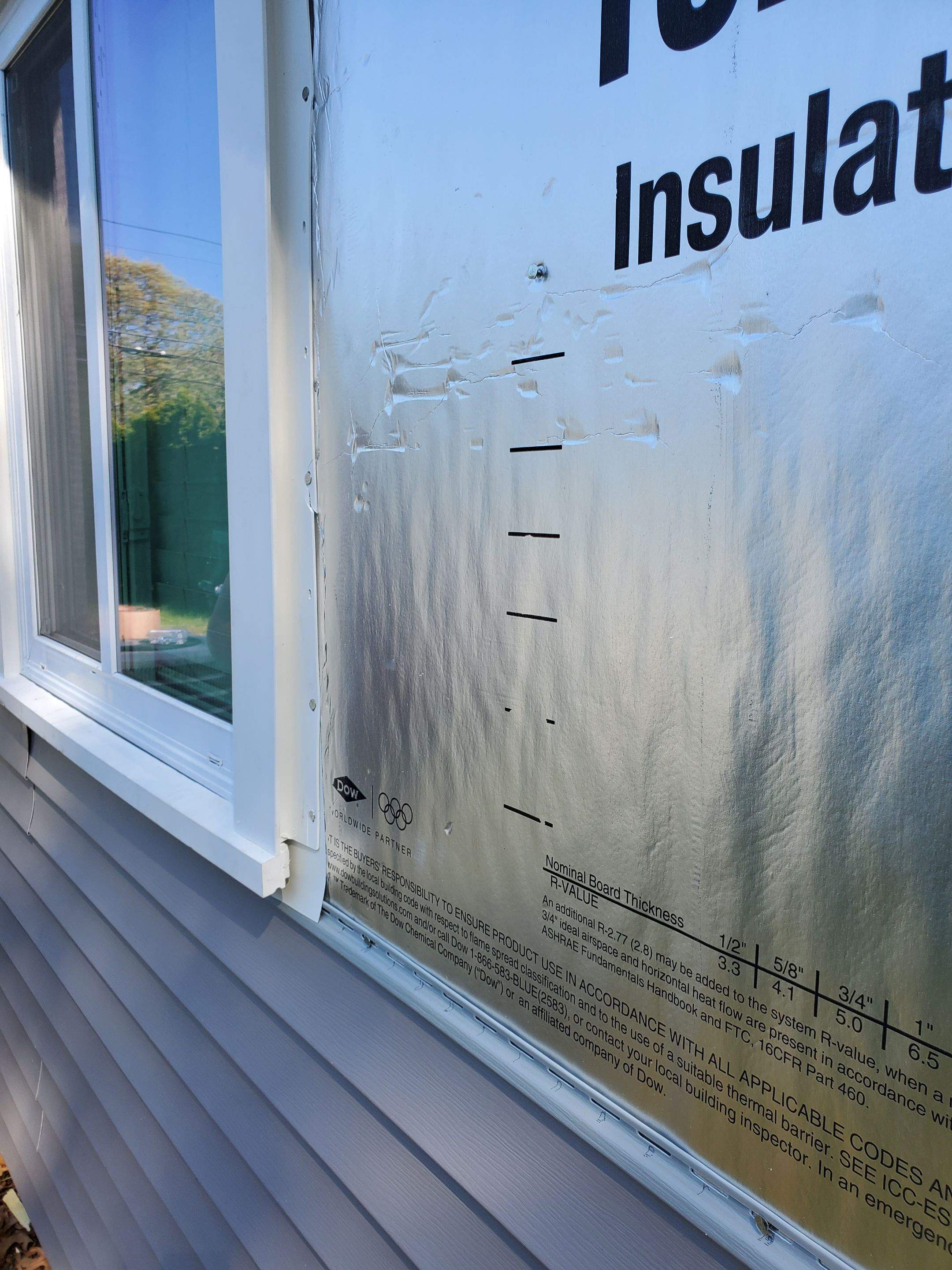Siding Installation using insulation, PVC trim and vinyl siding by UBrothers Construction