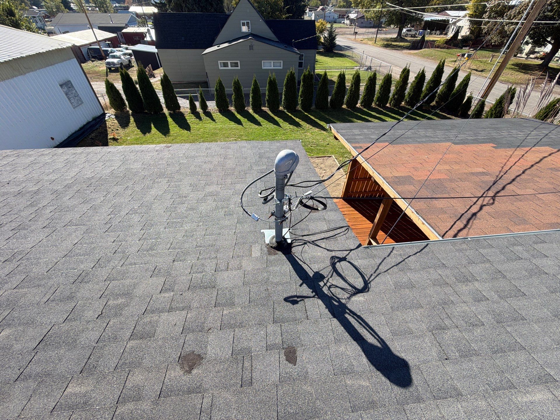 Residential Asphalt Shingle Roof Replacement and Skylight Installation in Spokane by Alpine Roofing