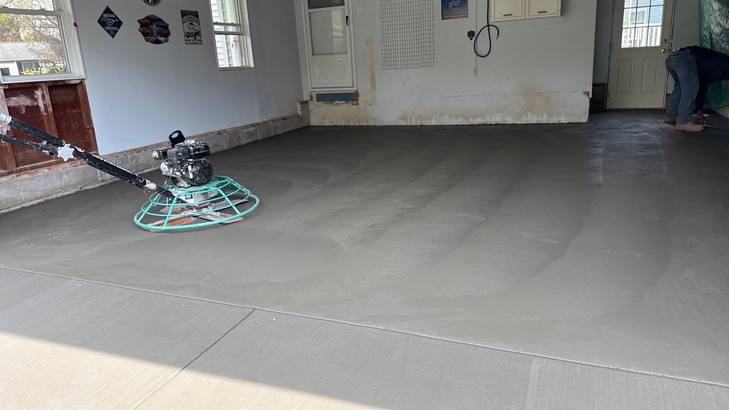 Concrete garage floor replacement  by NG Masonry & Construction LLC