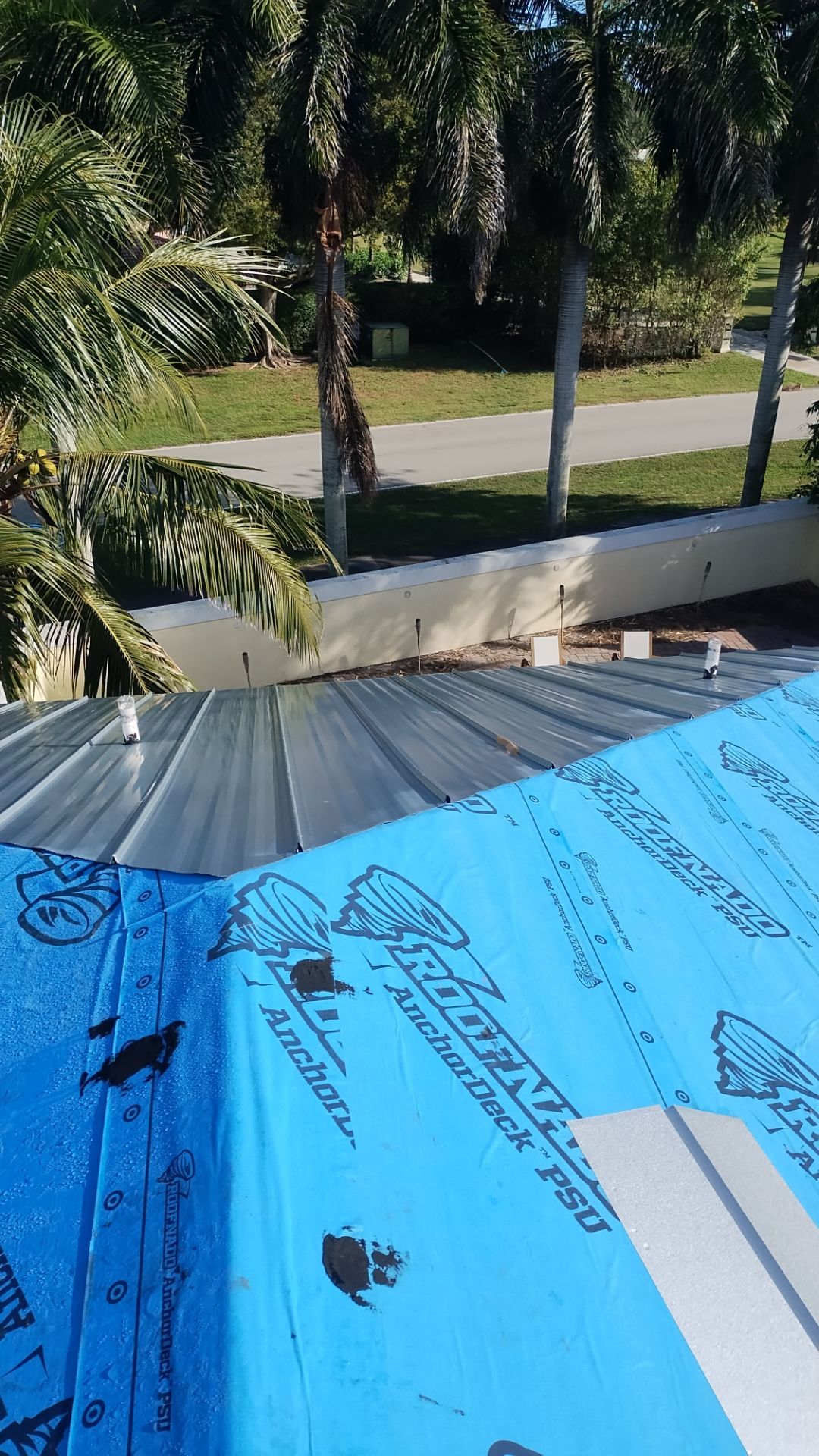 Residential Roofing Installation using 1" Nail strip metal roof by BLUES BROTHERS ROOFING
