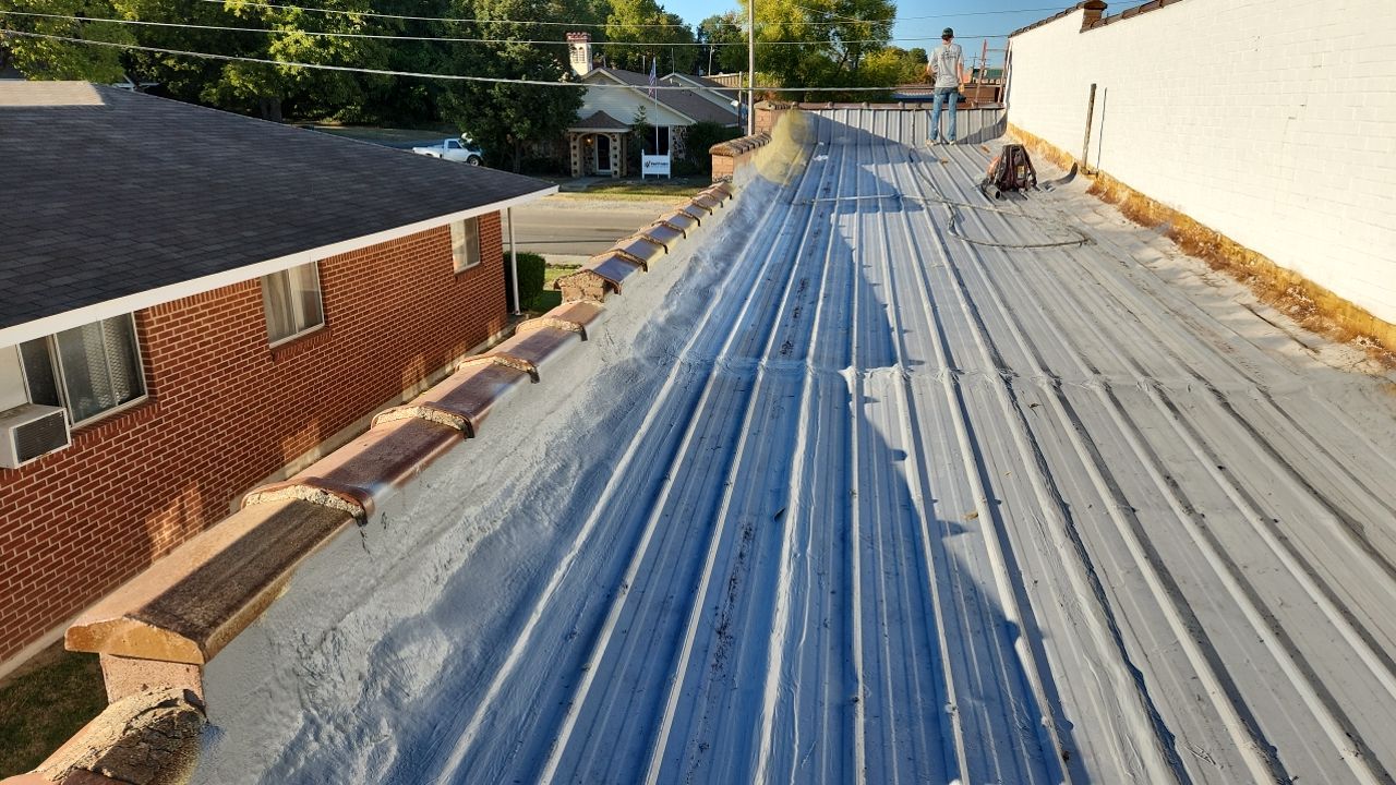 Commercial Roofing Installation using Aldocoat Coatings by Hostetler Roofing