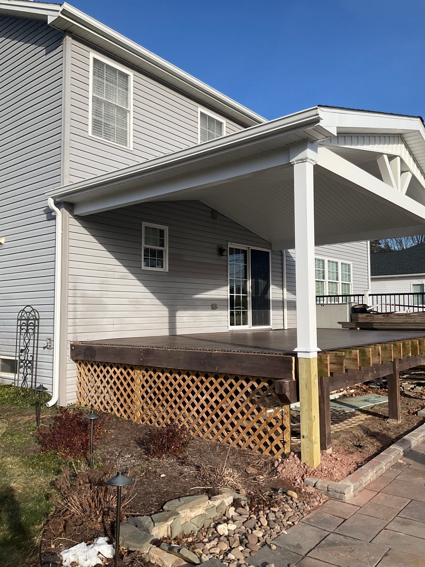 Custom Gable Porch Roof Addition Over Existing Deck in Halifax by Esh Builders