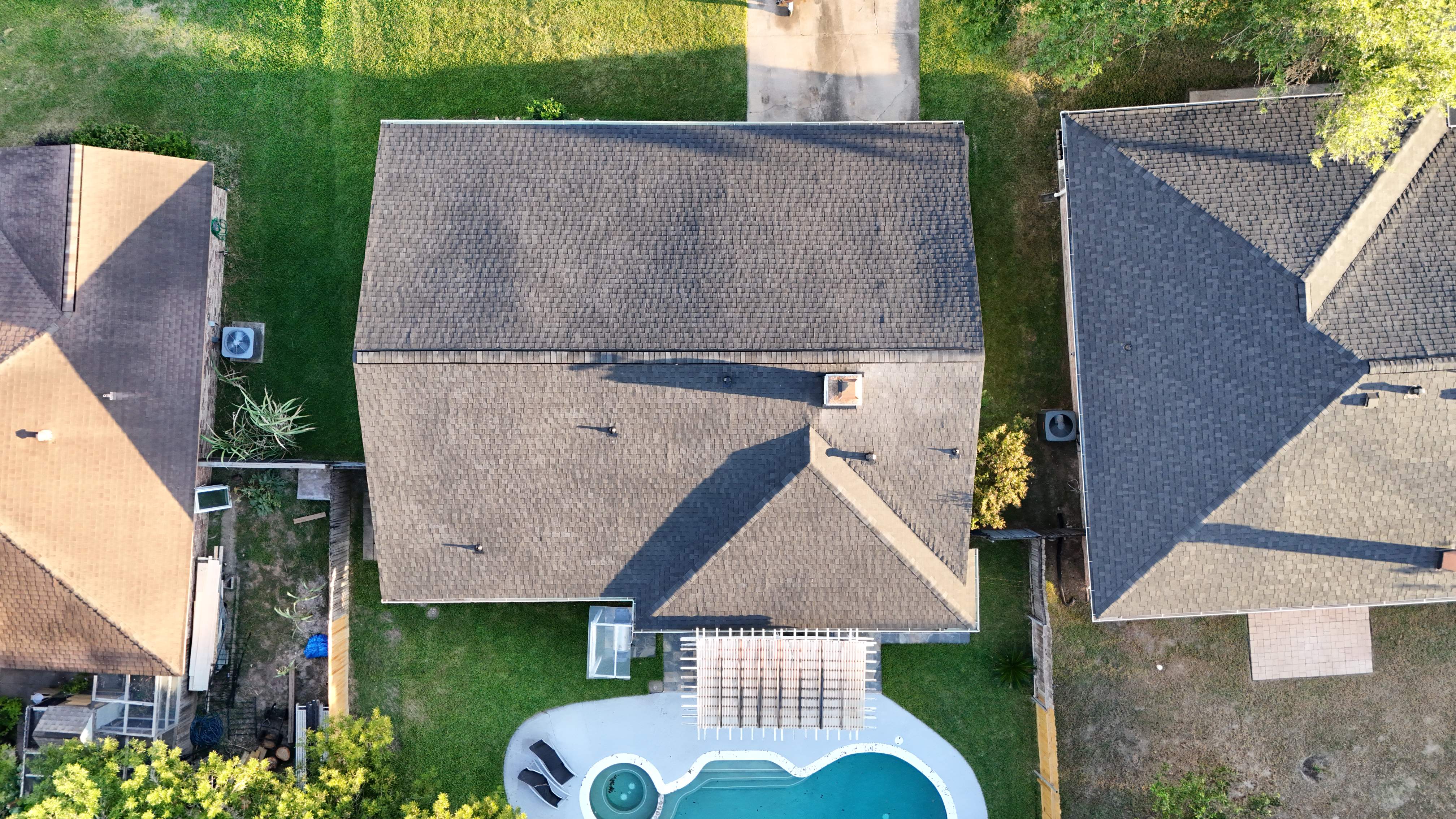 Poolside Roof Replacement in Smoky Gray — Houston, TX by PL Roofing & SB Roofing, LLC.