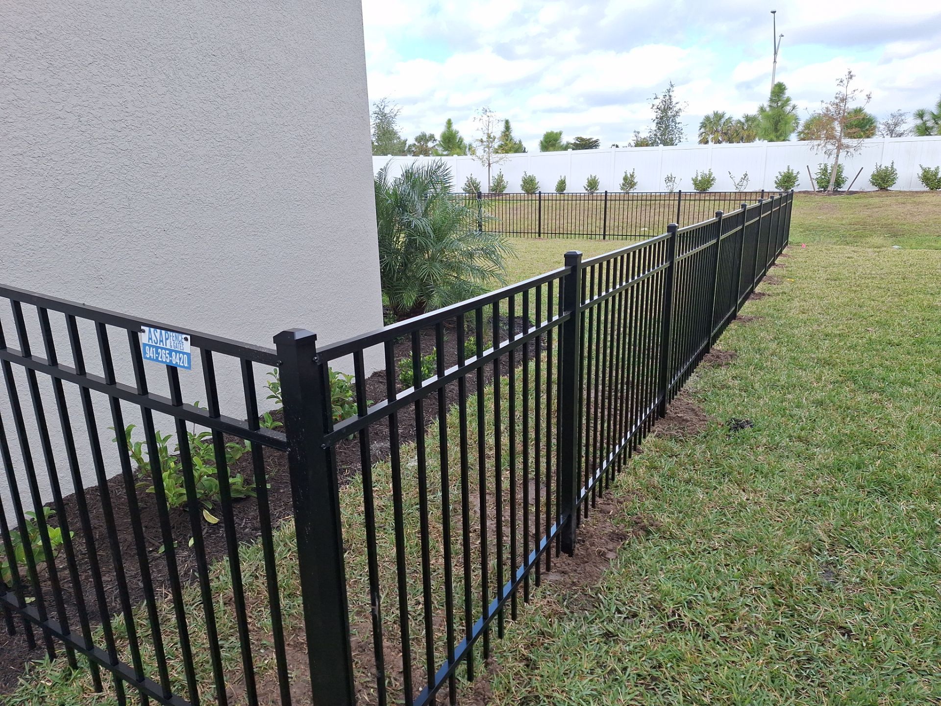 Aluminum Fence Installation using 4ft 3 Rail Black Aluminum Fence by Asap fence and gates, LLC