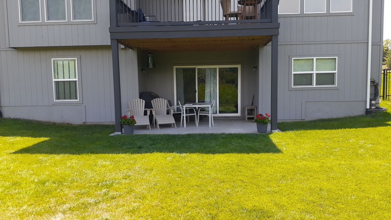 Back Yard Paver Patio by LAND ESCAPES LLC