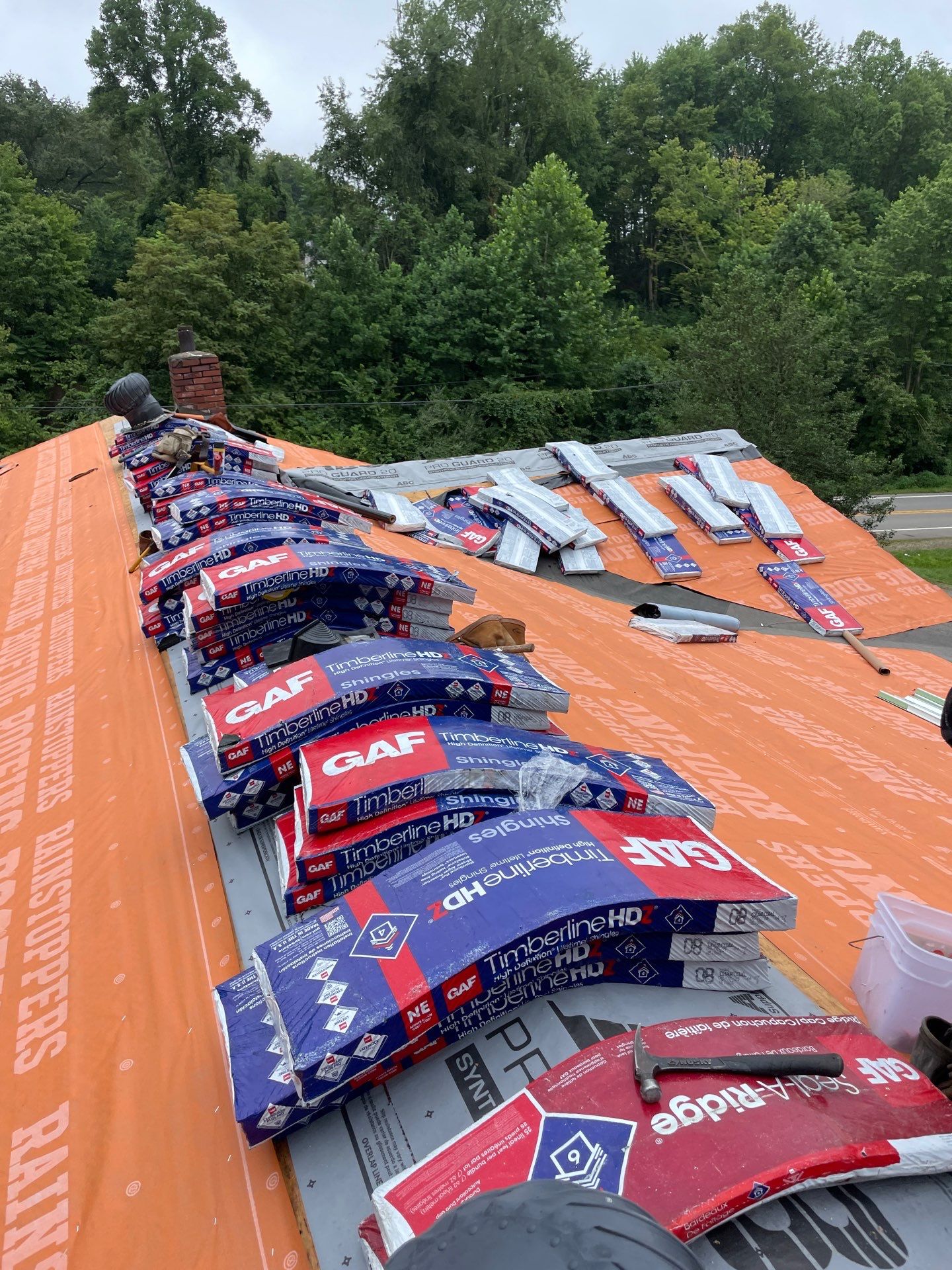 Residential Roofing Installation using GAF Timberline HDZ Charcoal by Rainstoppers Roofing