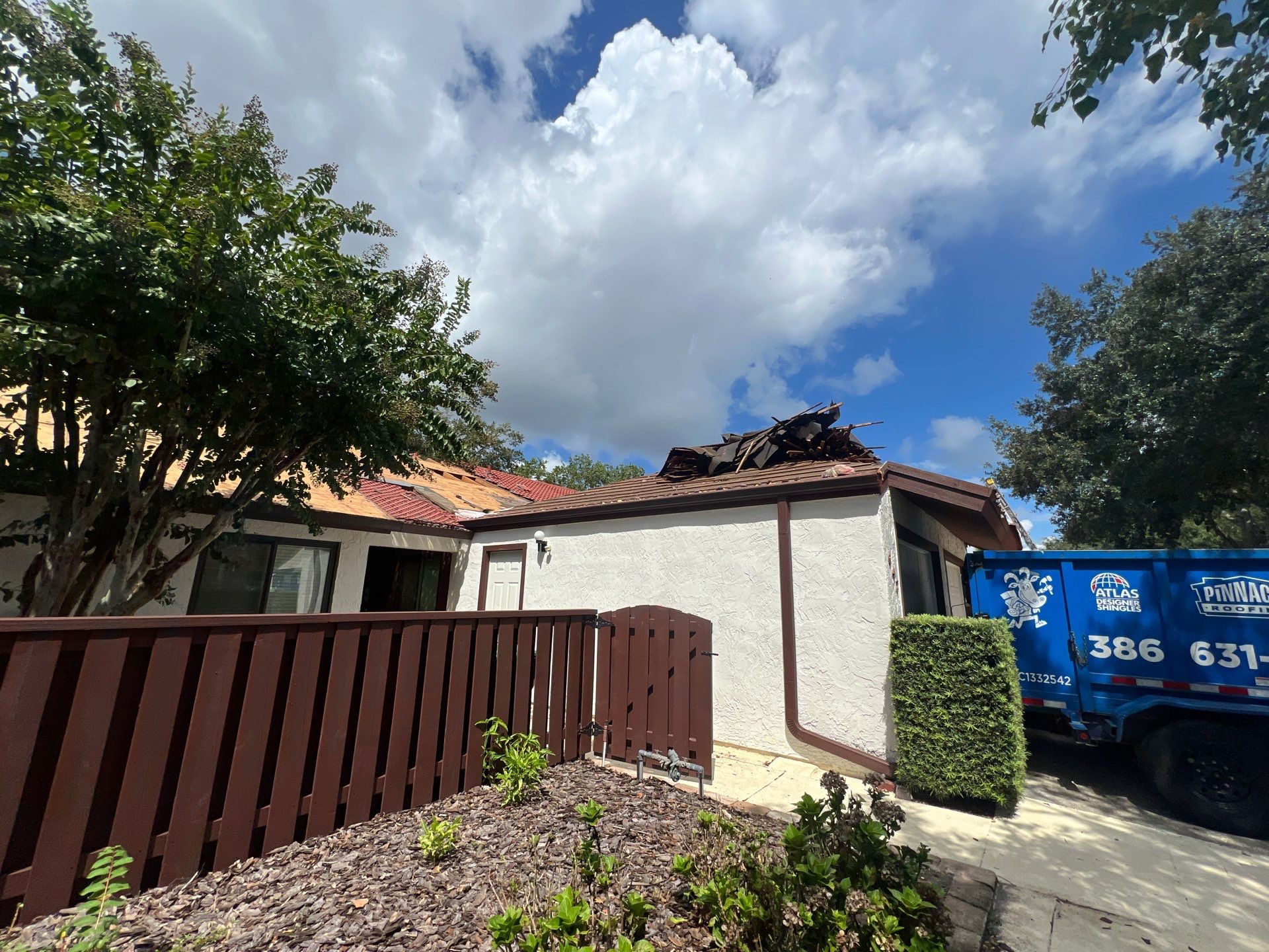 Residential Tile Roof Replacement and Gutter Installation in Winter Park by Pinnacle Roofing Group