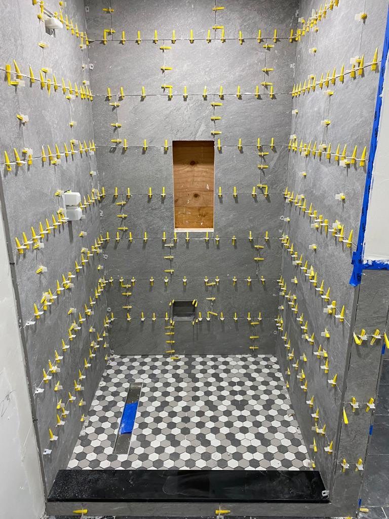 Bathroom Remodel using Tile by Home Concepts Construction