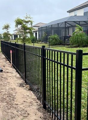 Aluminum Fence Installation using Black 3 Rail Aluminum Fence