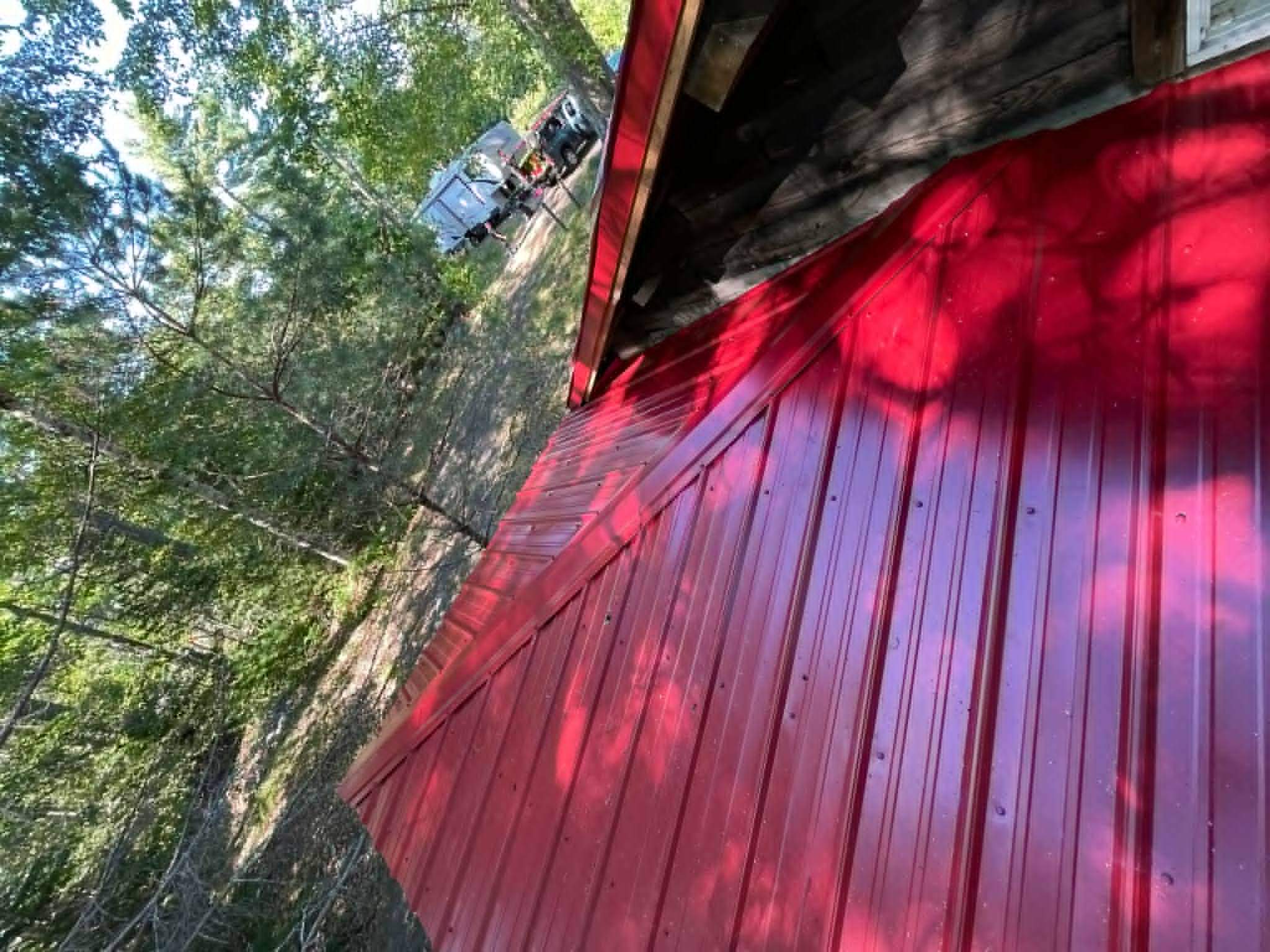 Cabin In the Woods by The B.A.R Roofing