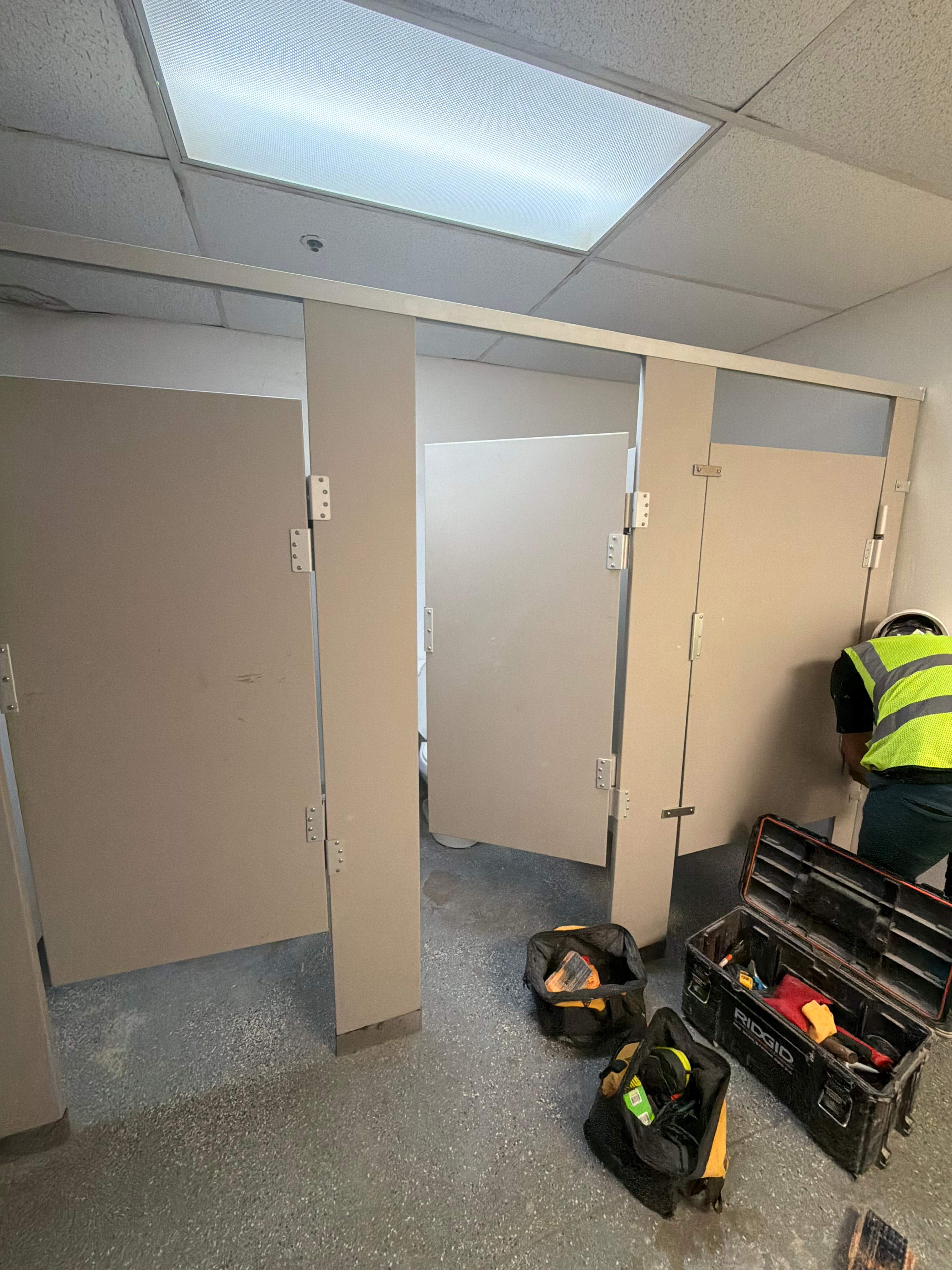 Commercial Restroom Renovation with Epoxy Flooring in Sarasota by Vertical General Contracting 