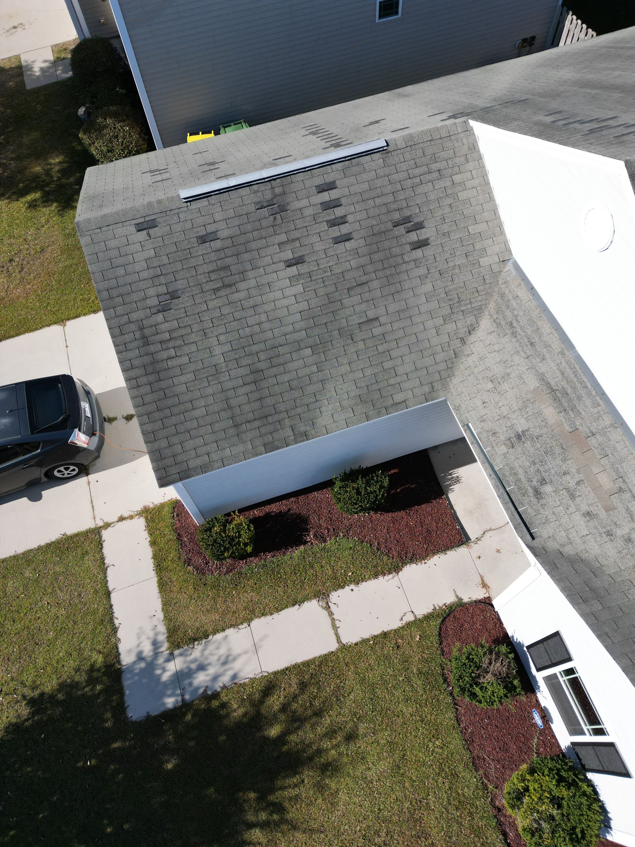 Residential Roofing Installation using Atlas Pinnacle Pristine Black Shadow. by Talya Roofing