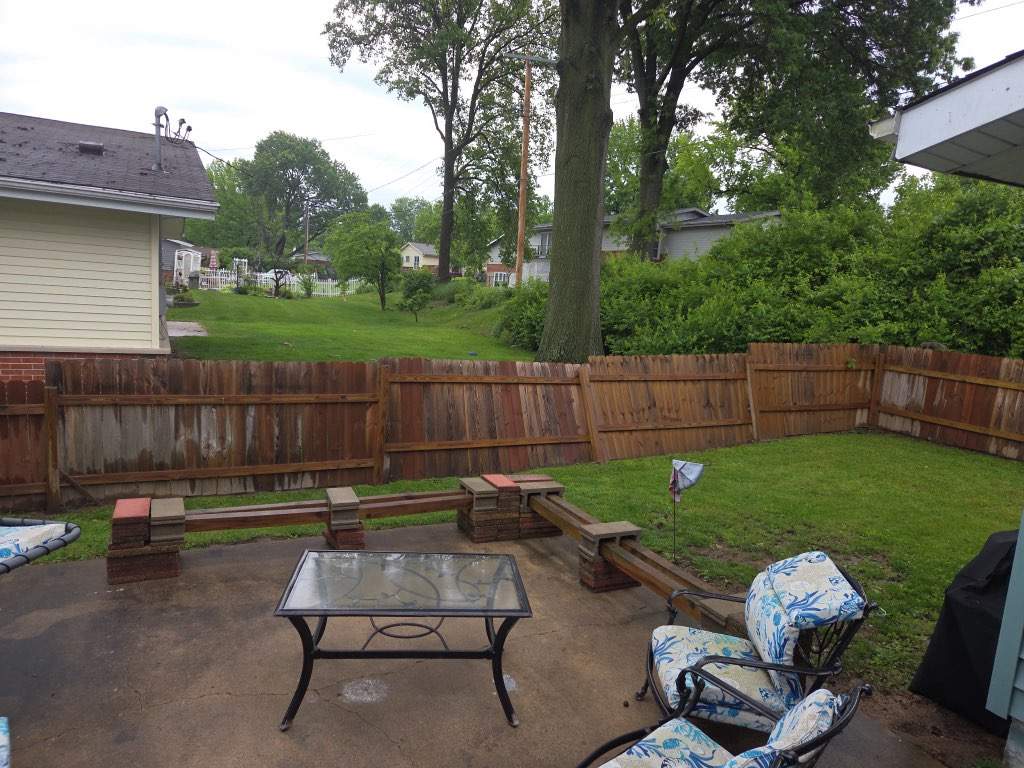 Wood Fence Post Replacement & Stabilization – Florissant, MO by Legendary Services Company LLC.
