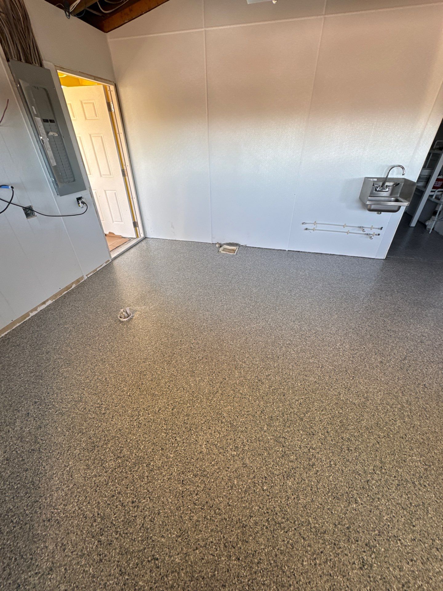 Commercial Restroom Refresh: Seamless 'Tidal Wave' Flake for a Repeat Client by Performance Floors & Coating