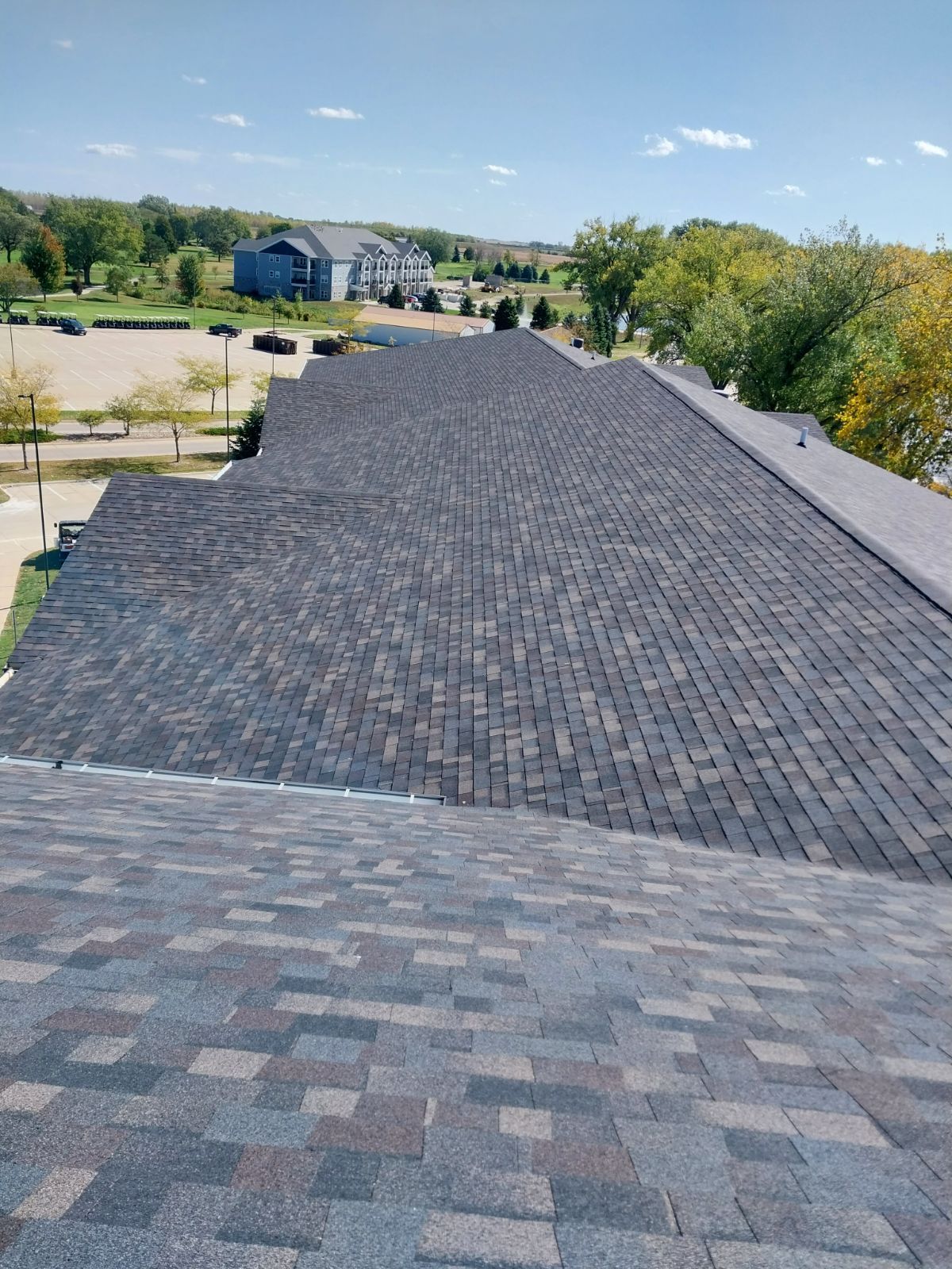 Commercial Roofing Installation using Shingles by Grell Roofing, LLC
