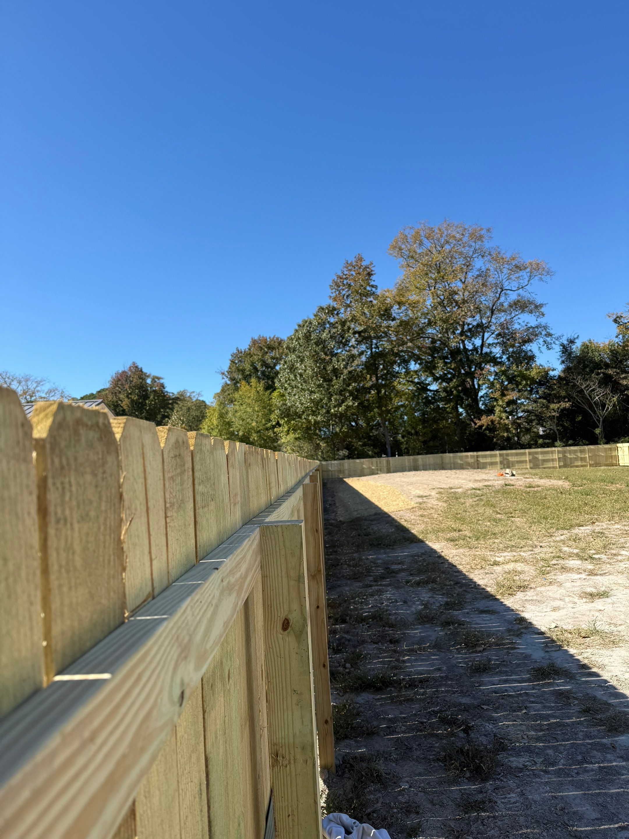 A Fresh Start with a Brand-New Wood Fence by Tidewater Trim & Deck