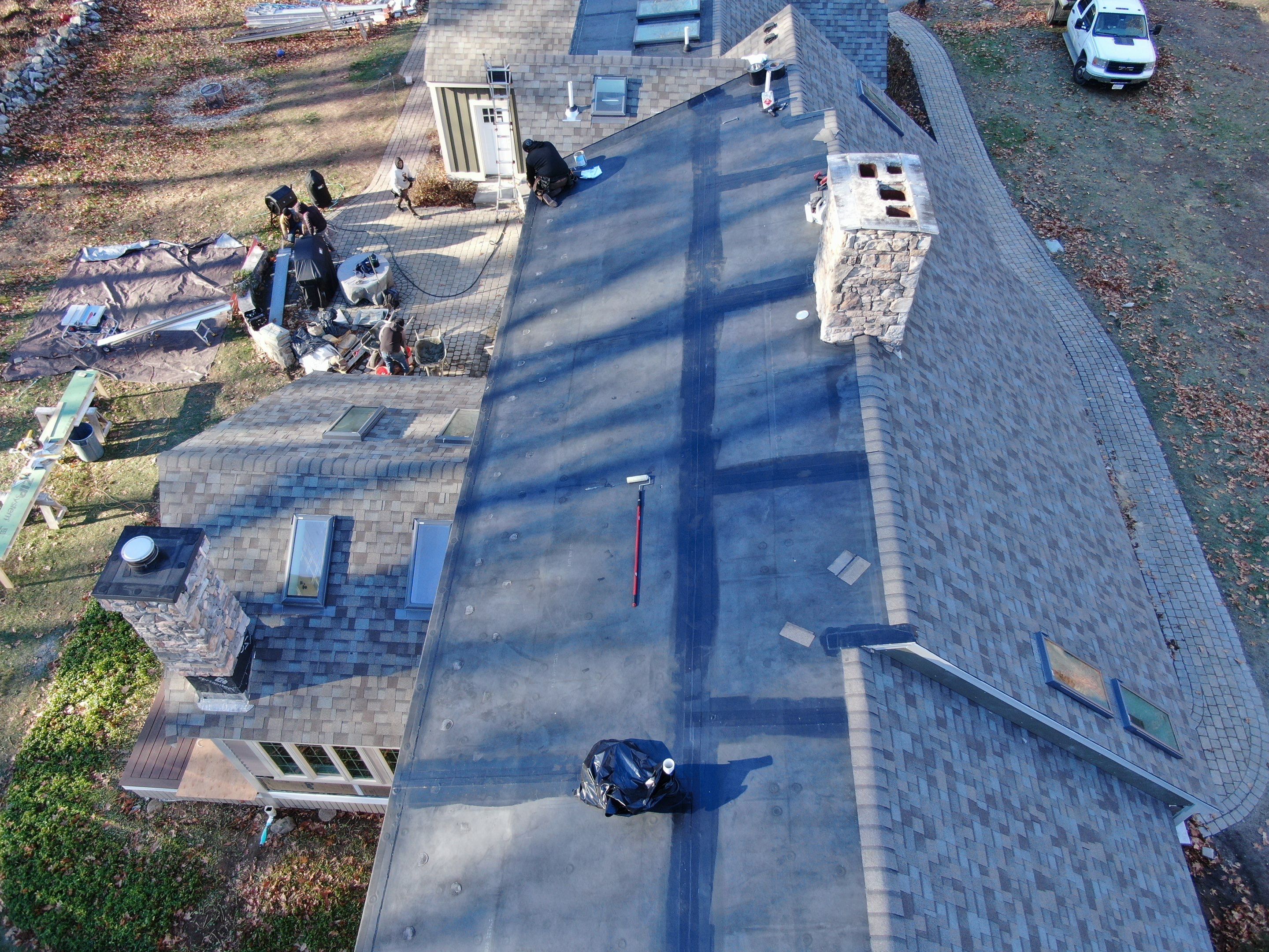 Complete House & Barn Roof with 13 Skylight Reflashing + EPDM Repairs by Mighty Dog Roofing of Greater Middlesex County