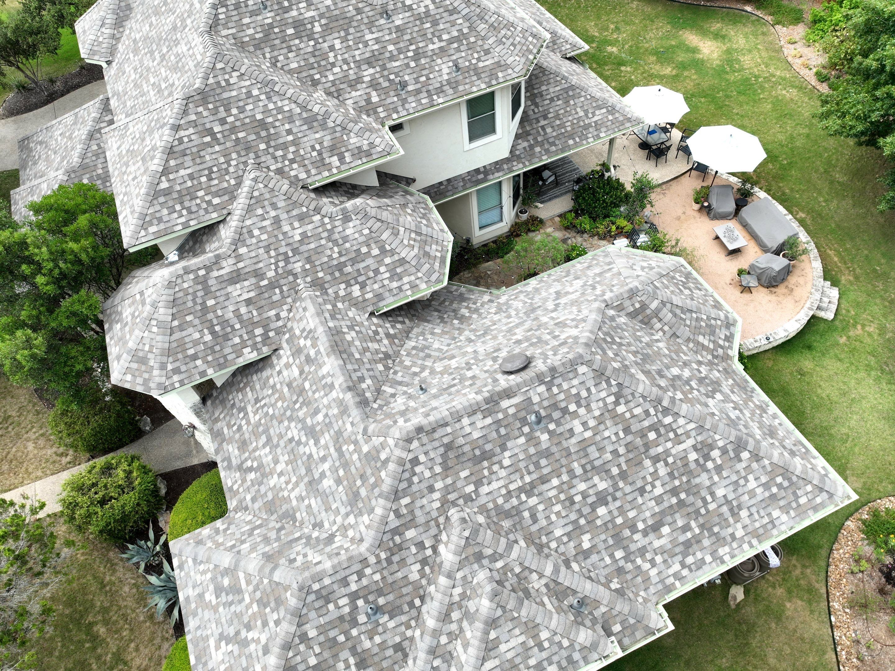 Residential Roof Replacement using 30 Year Laminate Shingles with High Profile Ridge by Premier Roofing and Contracting