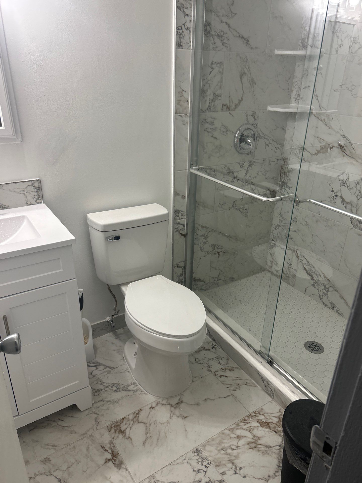 Dual Bathroom Makeover by urban green energy llc
