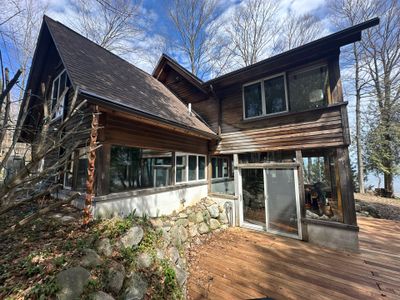 Gutter, Gutter Helmet and Copper Rain Chain Installation in Suttons Bay