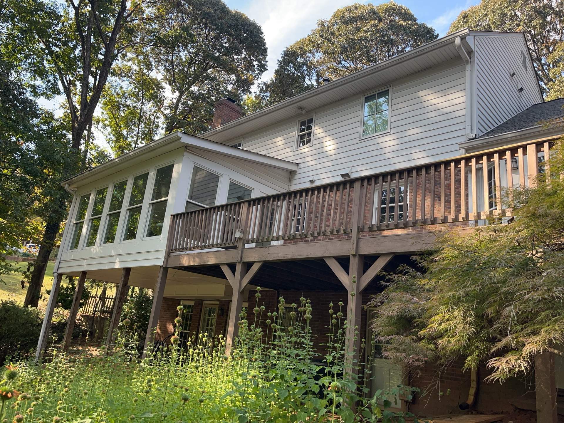 Deck Build and Screened-In Porch Install with Wild Hog 6' Black Mesh Panel Railing by Nelson Exteriors 