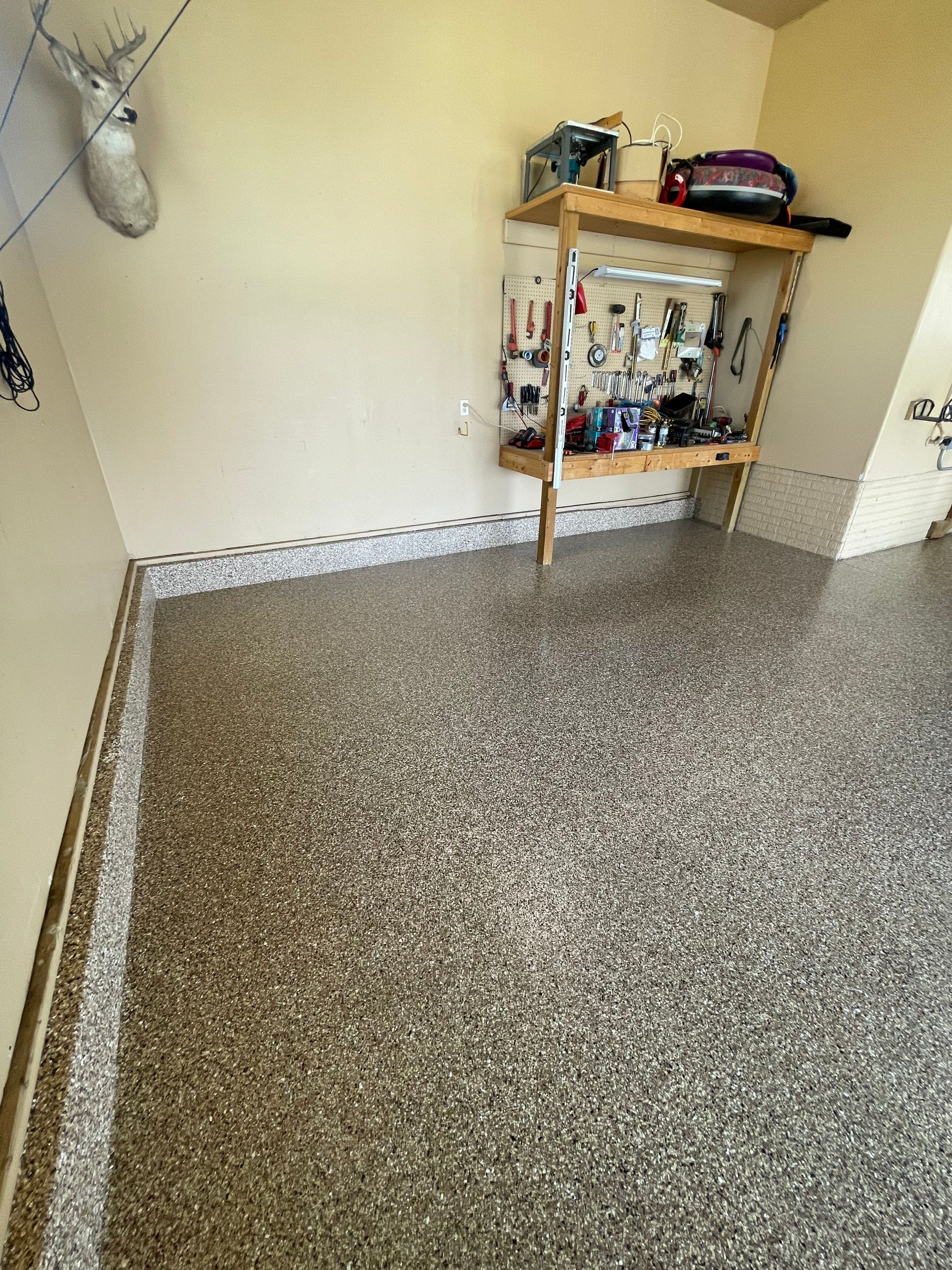 Residential Garage Floor Transformation with Speckled Epoxy Coating by Select Painting, Coatings & Garage Cabinets