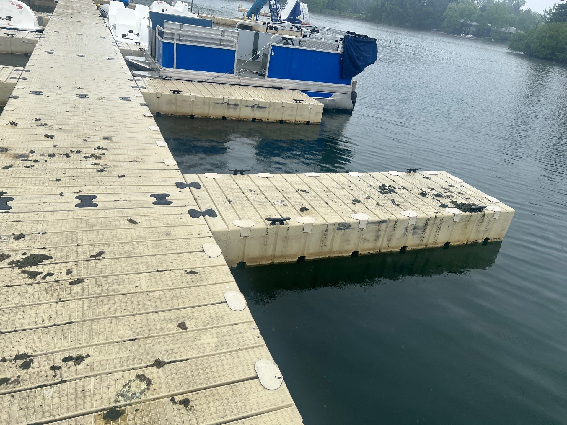 Power washing of floating dock by Northern Power Washing LLC.
