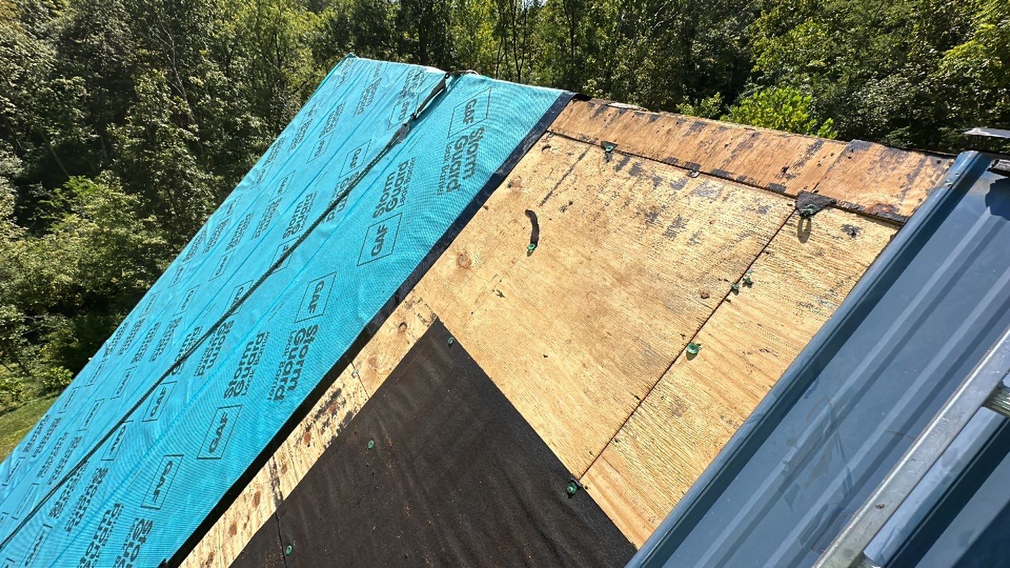 Residential Roofing Installation using Standing Seam Metal - Gallery Blue by RoofX 