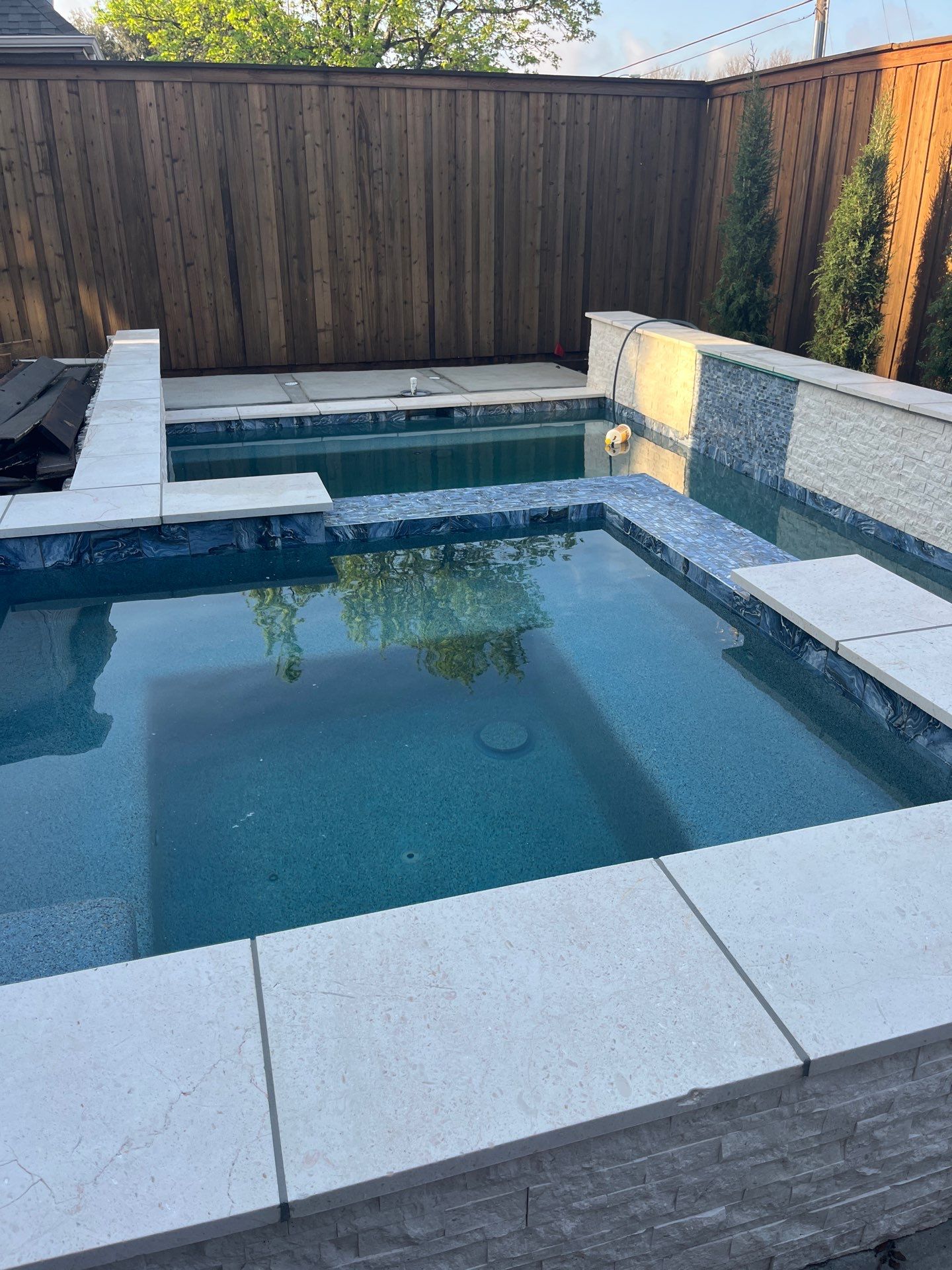 Geometric Pool and Spa with Glass Tile Walls by Pinnacle Pools and Spas - DFW