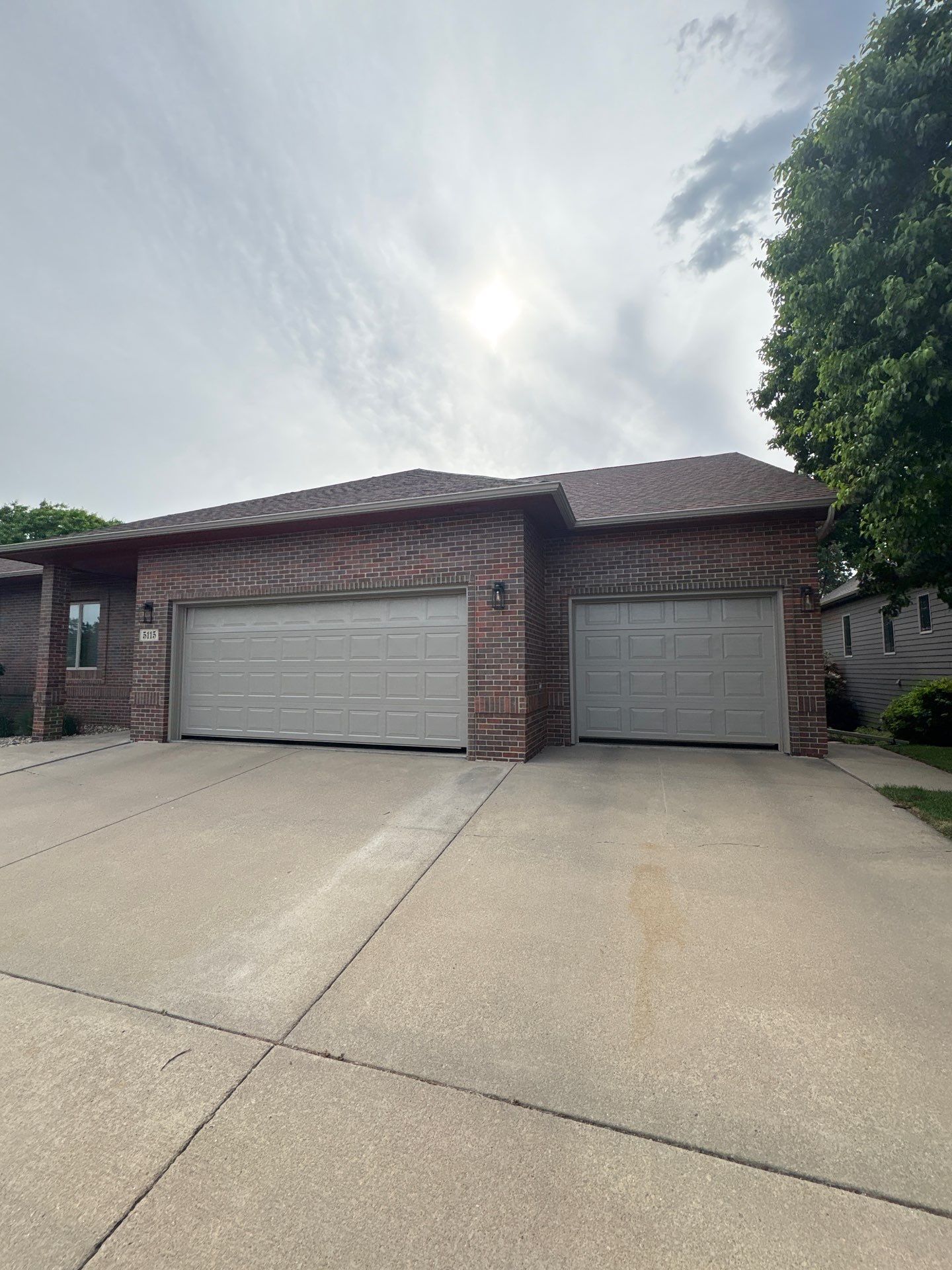 Full Exterior Home Repaint and Siding Refresh in Sioux Falls by Select Painting, Coatings & Garage Cabinets