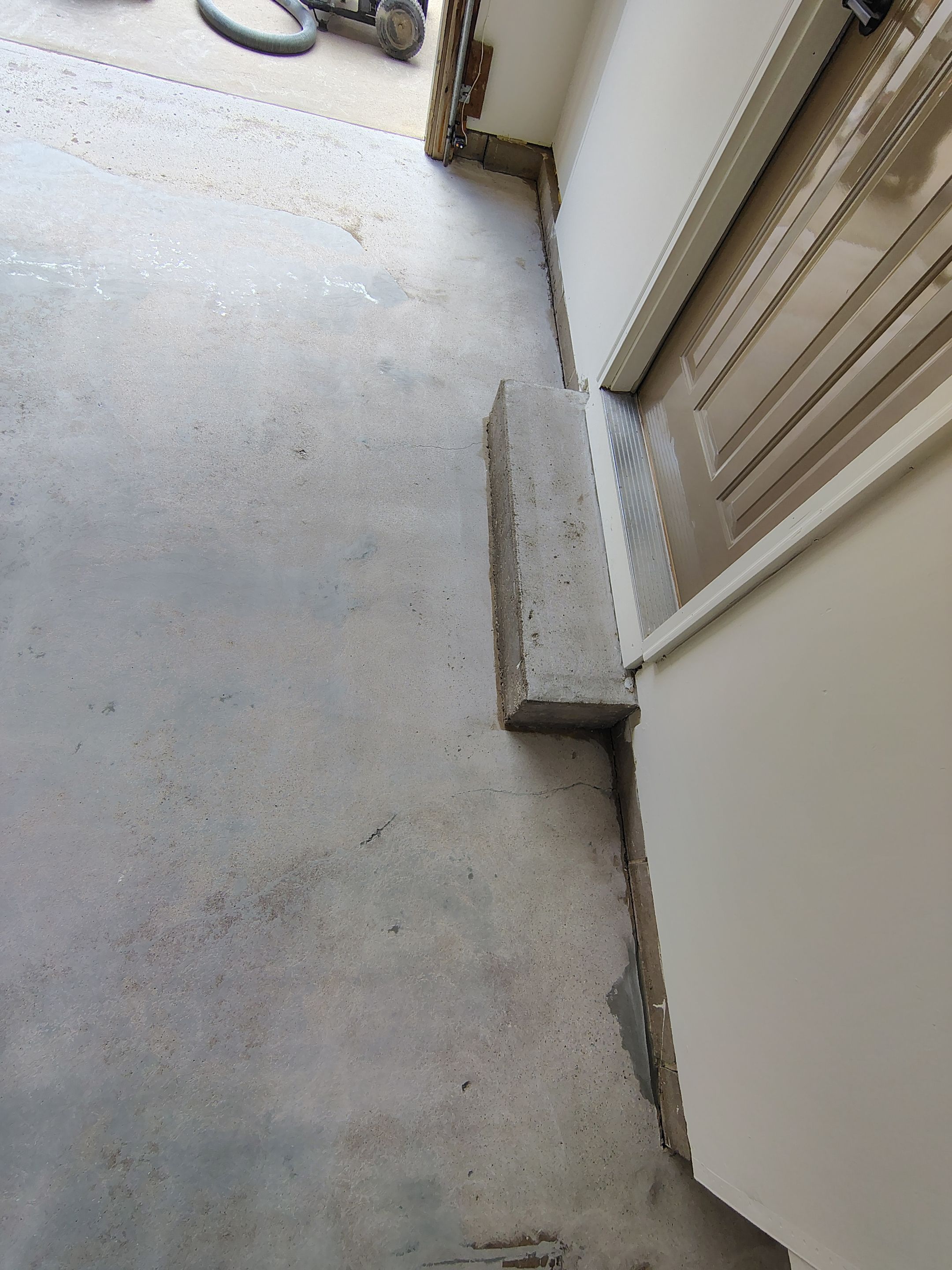 Full-Flake Epoxy Garage Floor Coating Installation in Sioux Falls by Select Painting, Coatings & Garage Cabinets