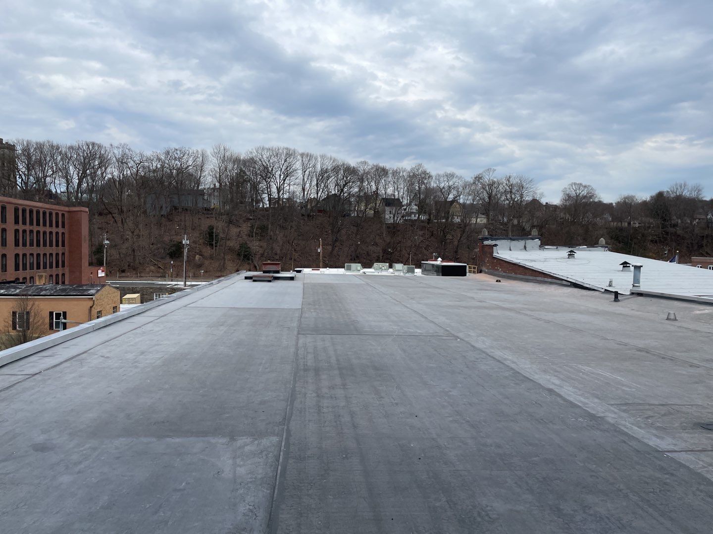 Commercial Roofing Installation using EPDM  by A Plus Exterior