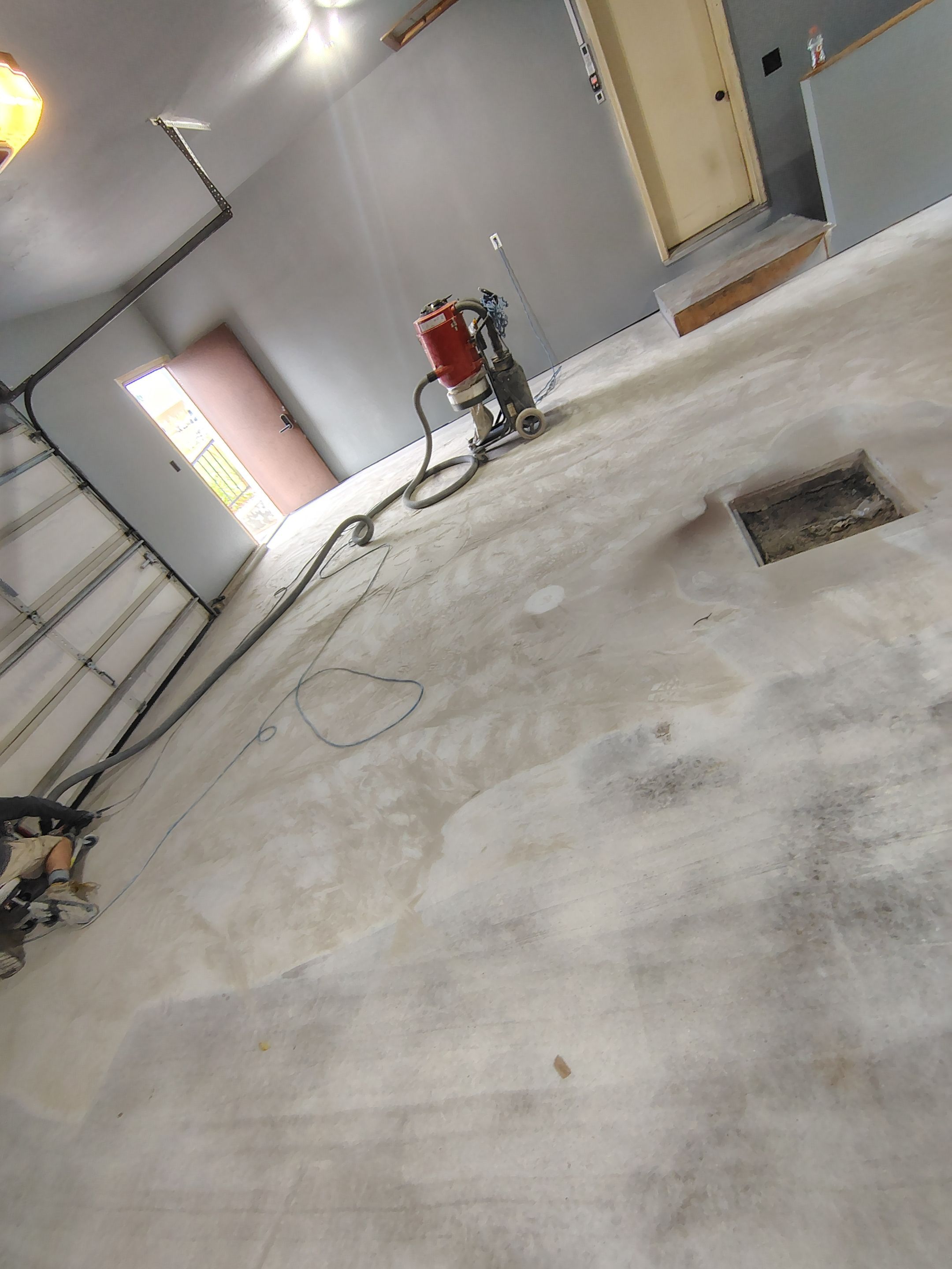 Garage Floor Concrete Coating and Surface Restoration in Colman by Select Painting, Coatings & Garage Cabinets