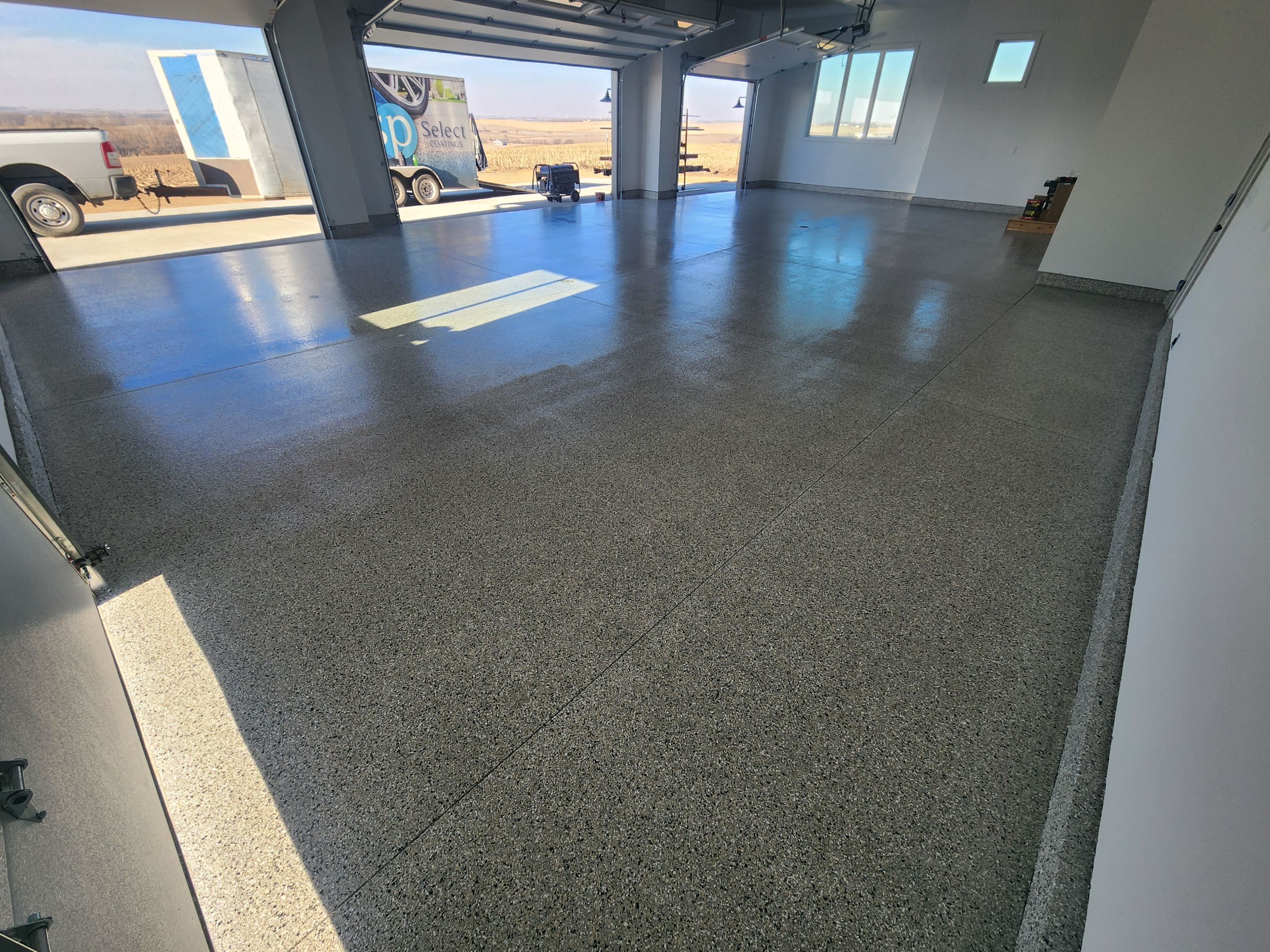 Garage using Domino by Select Painting, Coatings & Garage Cabinets